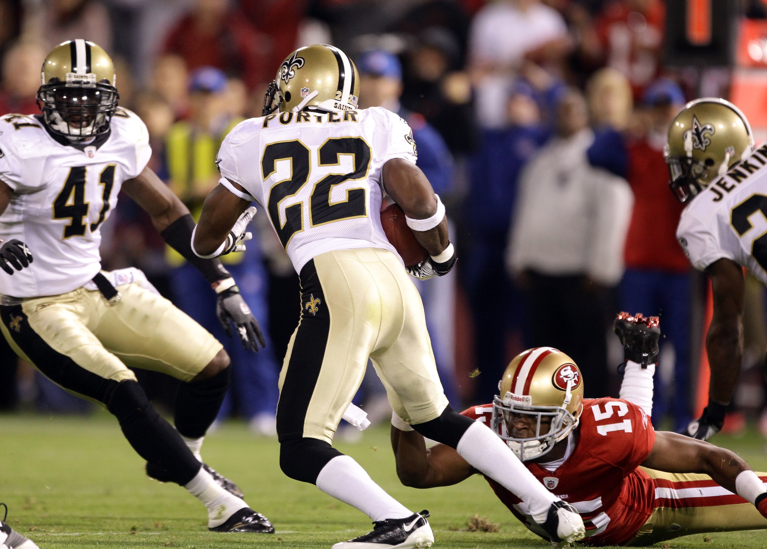 SAN FRANCISCO - SEPTEMBER 20:  Tracy Porter #22 of the New Orleans Saints intercepts a ball intended for Michael Crabtree #15 of the San Francisco 49ers at Candlestick Park on September 20, 2010 in San Francisco, California.  (Photo by Ezra Shaw/Getty Ima