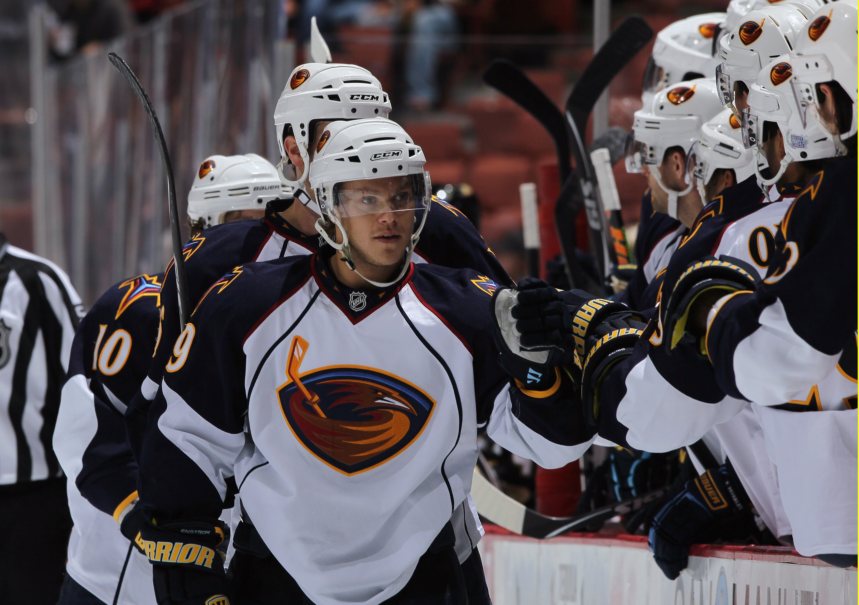 ANAHEIM, CA - OCTOBER 15:  Tobias Enstrom #39 of the Atlanta Thrashers receives high fives from the bench against the Anaheim Ducks at Honda Center on October 15, 2010 in Anaheim, California.  (Photo by Jeff Gross/Getty Images)