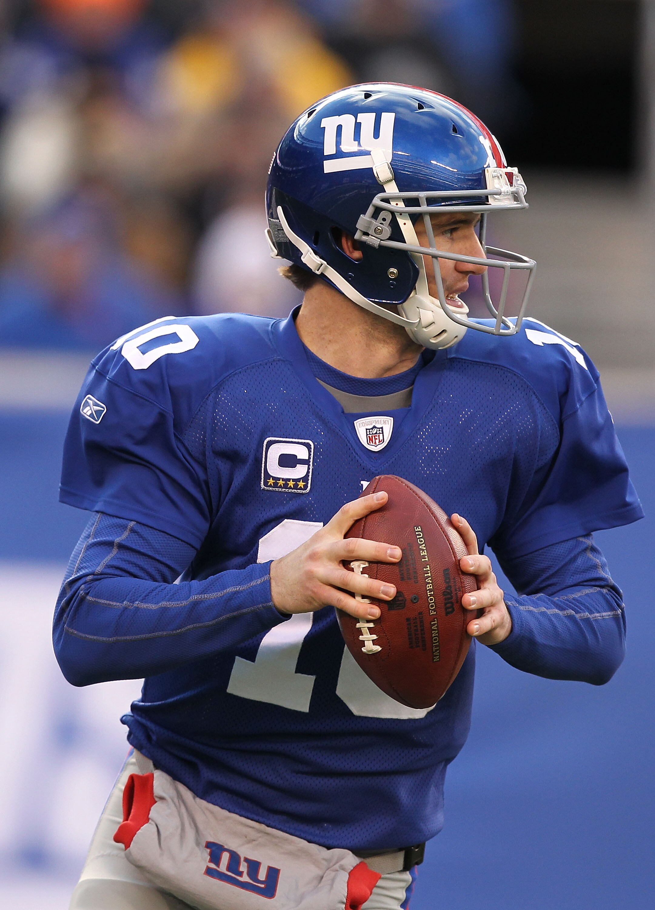 EAST RUTHERFORD, NJ - DECEMBER 05:  Eli Manning #10 of the New York Giants in action against the Washington Redskins during their game on December 5, 2010 at The New Meadowlands Stadium in East Rutherford, New Jersey.  (Photo by Al Bello/Getty Images)