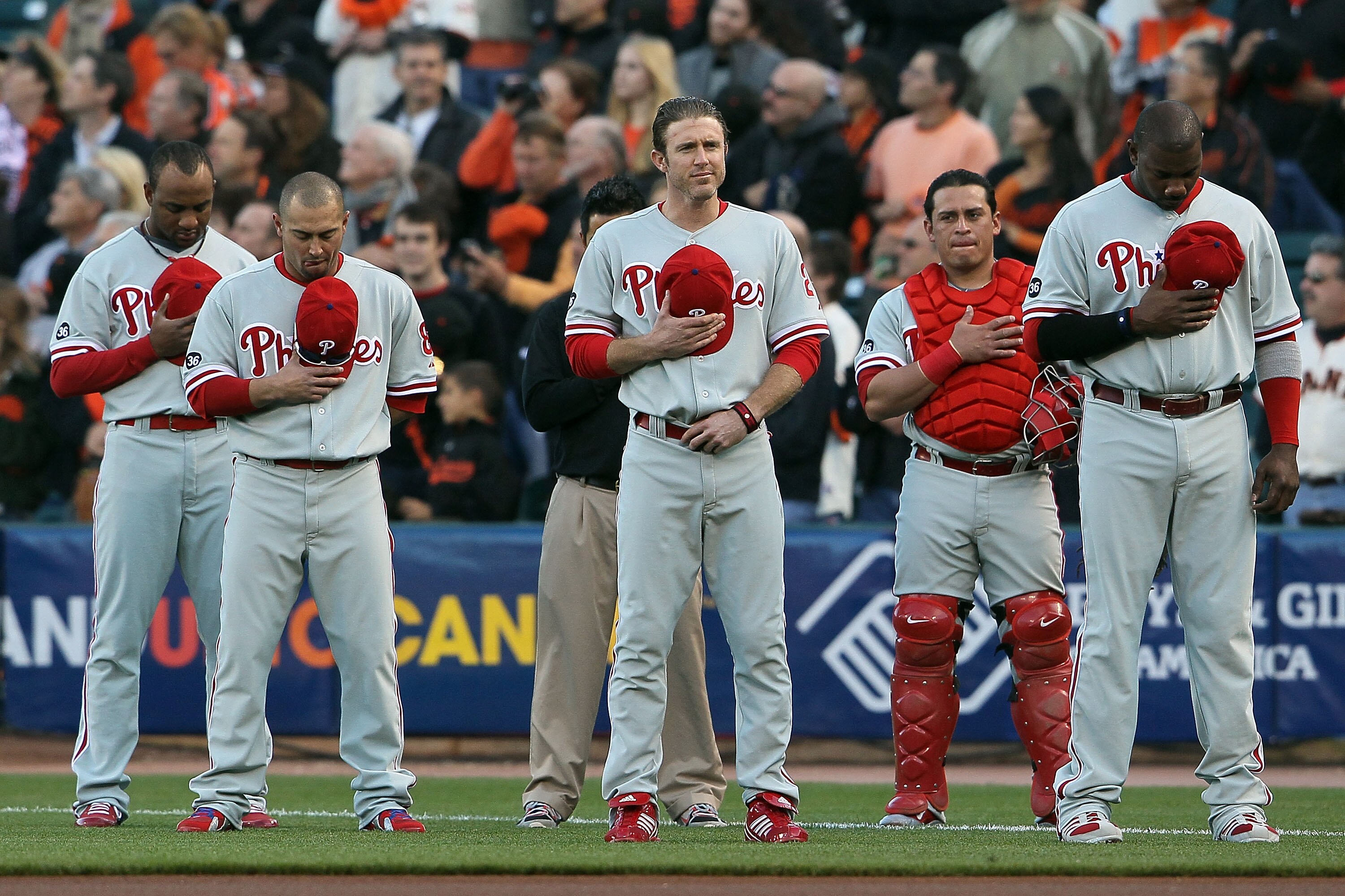 SAN FRANCISCO - OCTOBER 20:  (L-R) Ben Francisco #10, Shane Victorino #8, Chase Utley #26, Carlos Ruiz #51 and Ryan Howard #6 of the Philadelphia Phillies stand during the national anthem before Game Four of the NLCS during the 2010 MLB Playoffs against t