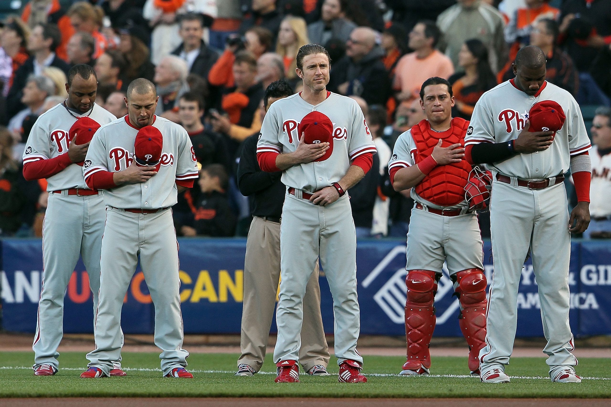 SAN FRANCISCO - OCTOBER 20:  (L-R) Ben Francisco #10, Shane Victorino #8, Chase Utley #26, Carlos Ruiz #51 and Ryan Howard #6 of the Philadelphia Phillies stand during the national anthem before Game Four of the NLCS during the 2010 MLB Playoffs against t