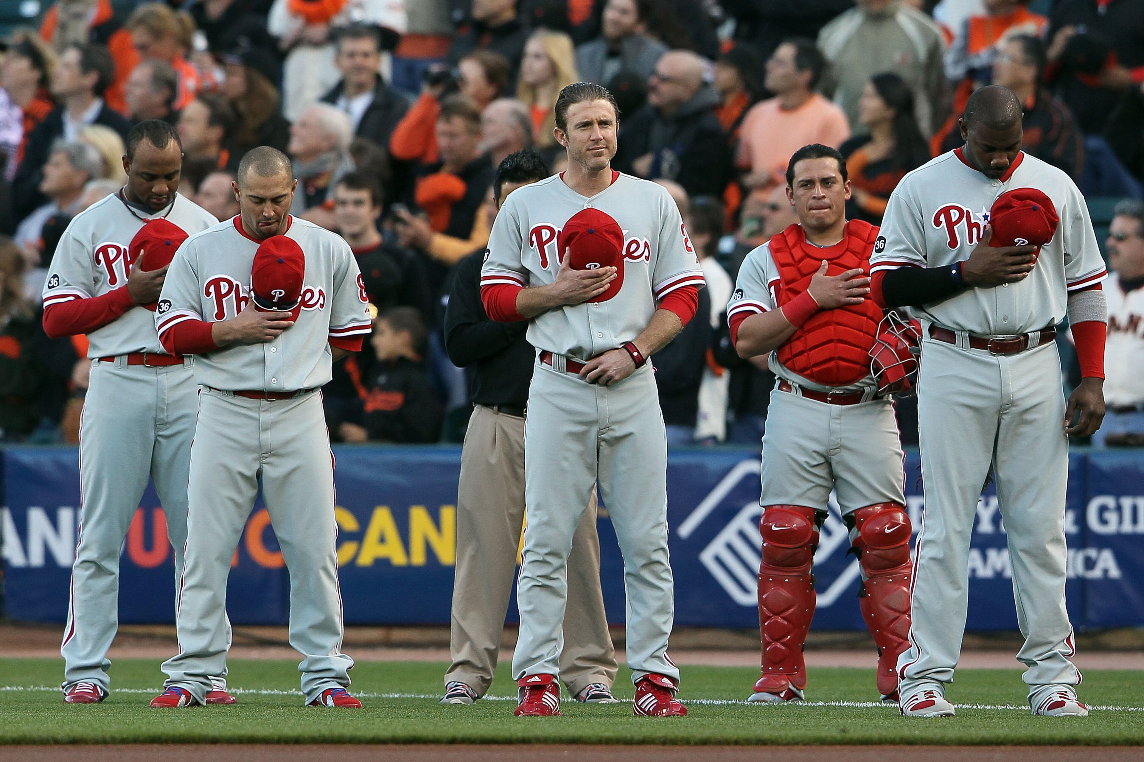 SAN FRANCISCO - OCTOBER 20:  (L-R) Ben Francisco #10, Shane Victorino #8, Chase Utley #26, Carlos Ruiz #51 and Ryan Howard #6 of the Philadelphia Phillies stand during the national anthem before Game Four of the NLCS during the 2010 MLB Playoffs against t