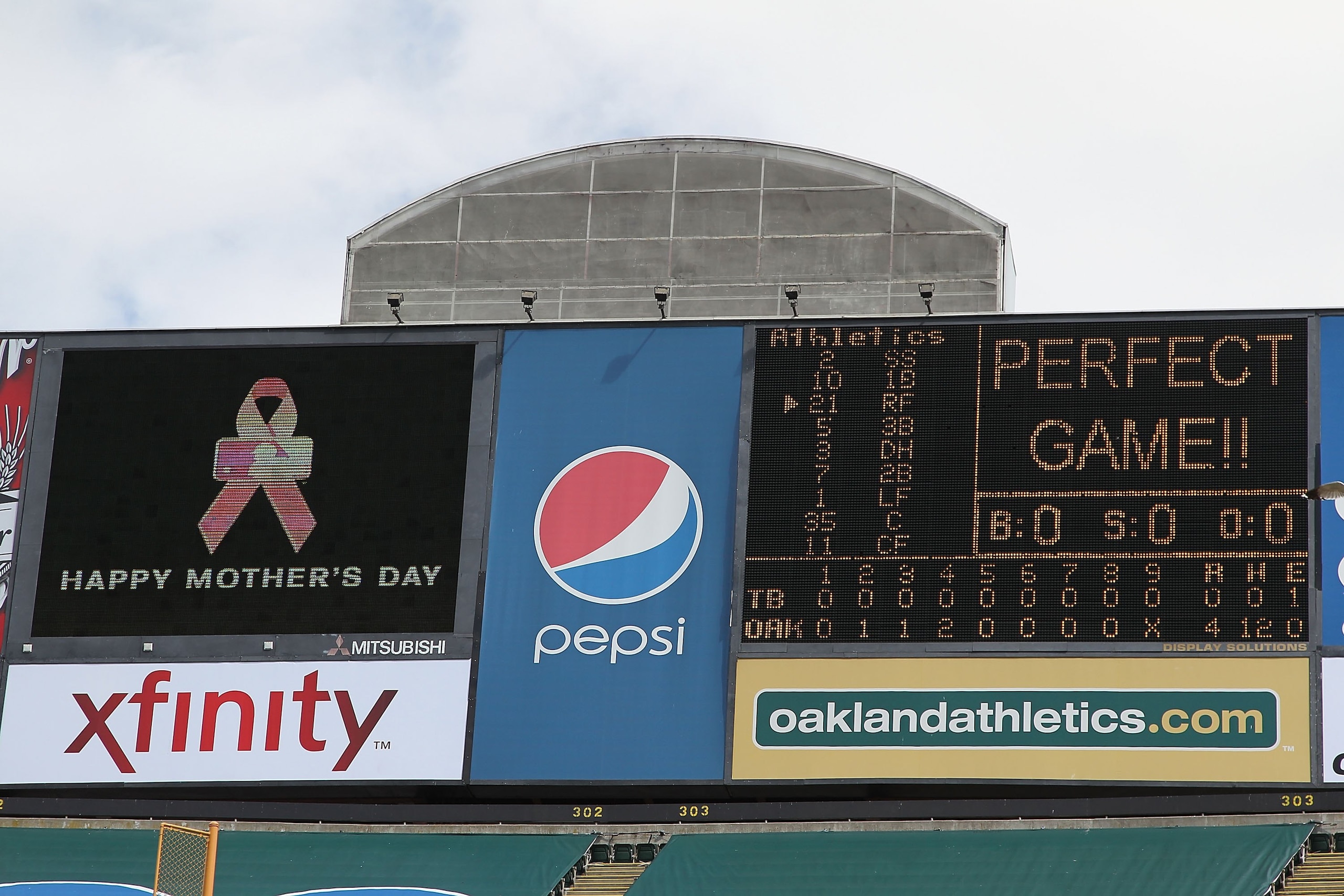 OAKLAND, CA - MAY 09:  Dallas Braden #51 of the Oakland Athletics celebrates after pitching a perfect game against the Tampa Bay Rays during an MLB game at the Oakland-Alameda County Coliseum on May 9, 2010 in Oakland, California.  (Photo by Jed Jacobsohn