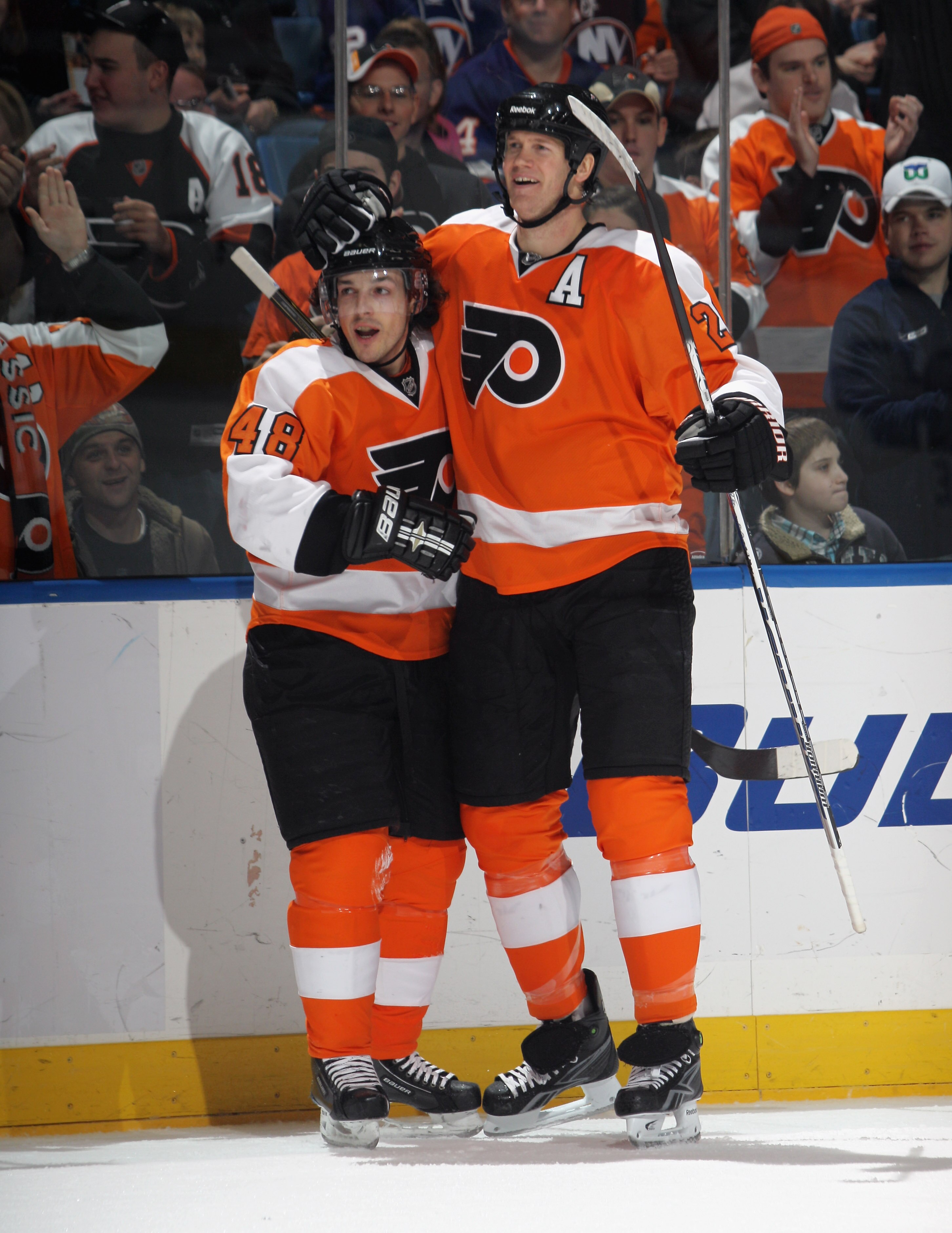 UNIONDALE, NY - DECEMBER 05: Danny Briere #48 (L) of the Philadelphia Flyers celebrates his game winning goal at 14:16 of the third period against the New York Islanders and is joined by Chris Pronger #20 at the Nassau Coliseum on December 5, 2010 in Unio