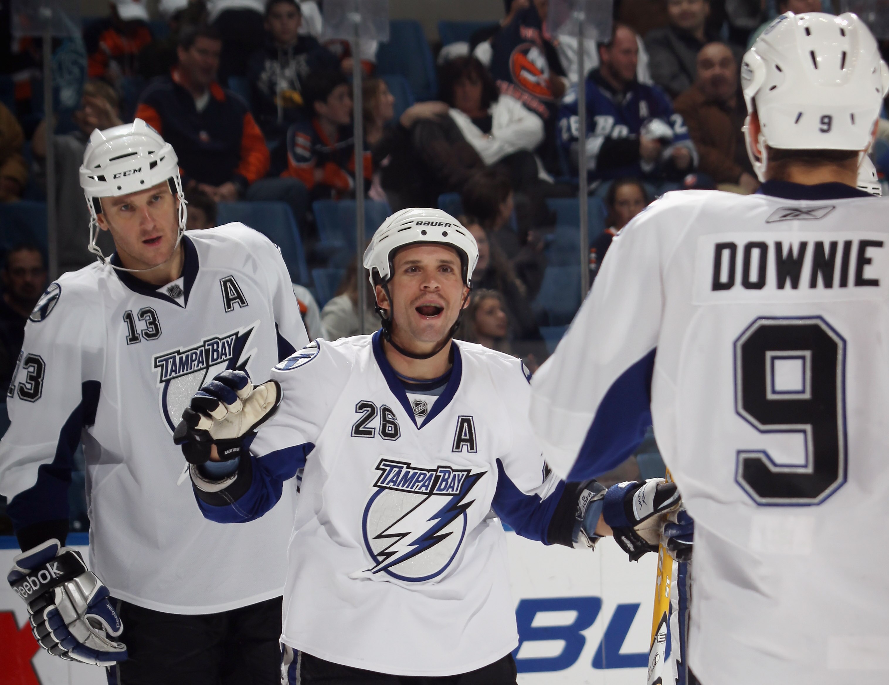 UNIONDALE, NY - NOVEMBER 17:  Martin St. Louis #26 of the Tampa Bay Lightning scores at 18:31 of the third period aganst the New York Islanders at the Nassau Coliseum on November 17, 2010 in Uniondale, New York. The Lightning defeated the Islanders 4-2.