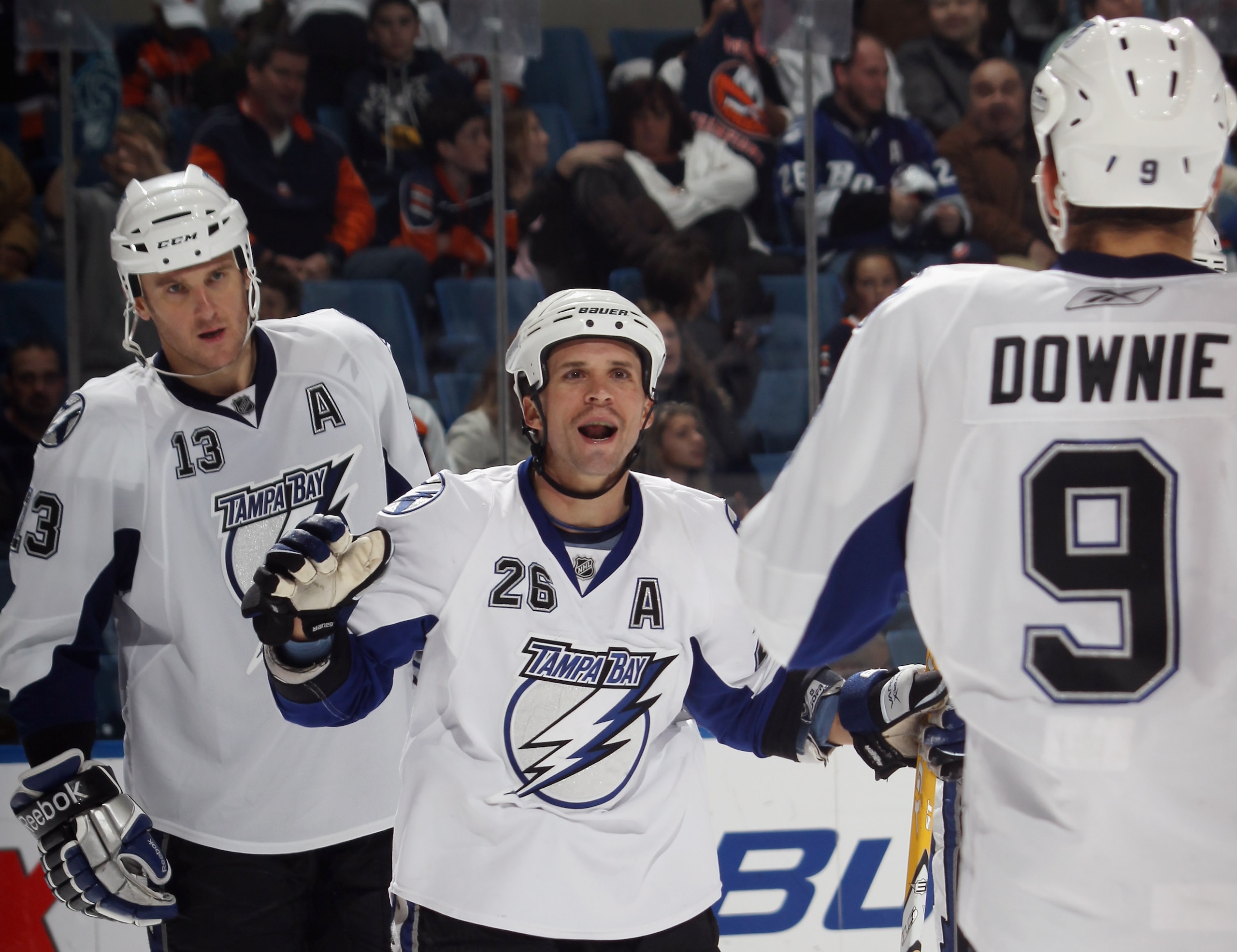 UNIONDALE, NY - NOVEMBER 17:  Martin St. Louis #26 of the Tampa Bay Lightning scores at 18:31 of the third period aganst the New York Islanders at the Nassau Coliseum on November 17, 2010 in Uniondale, New York. The Lightning defeated the Islanders 4-2.