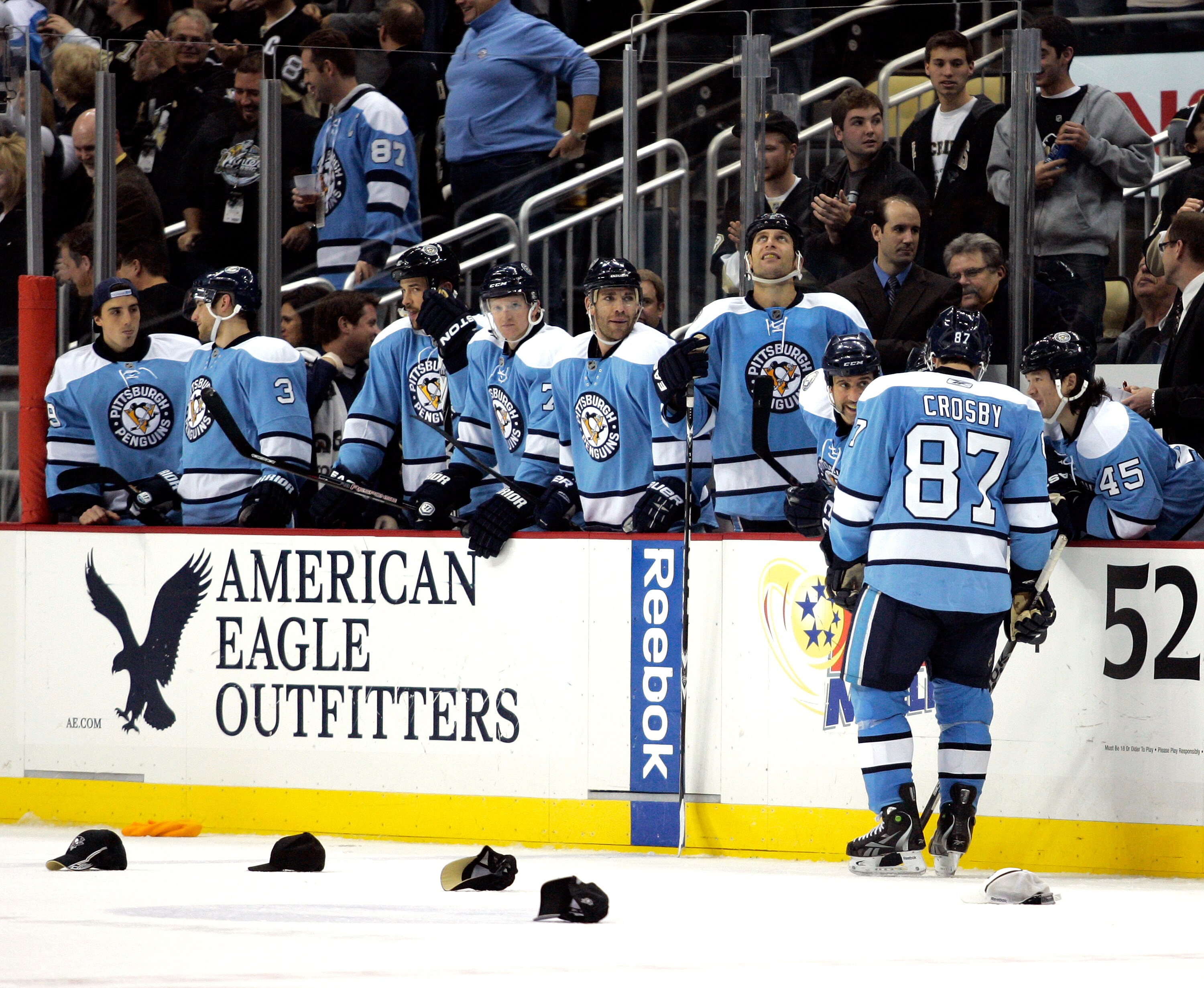 PITTSBURGH - NOVEMBER 27:  Sidney Crosby #87 of the Pittsburgh Penguins celebrates his hat trick goal with with teammatse against the Calgary Flames at Consol Energy Center on November 27, 2010 in Pittsburgh, Pennsylvania.  The Penguins defeated the Flame