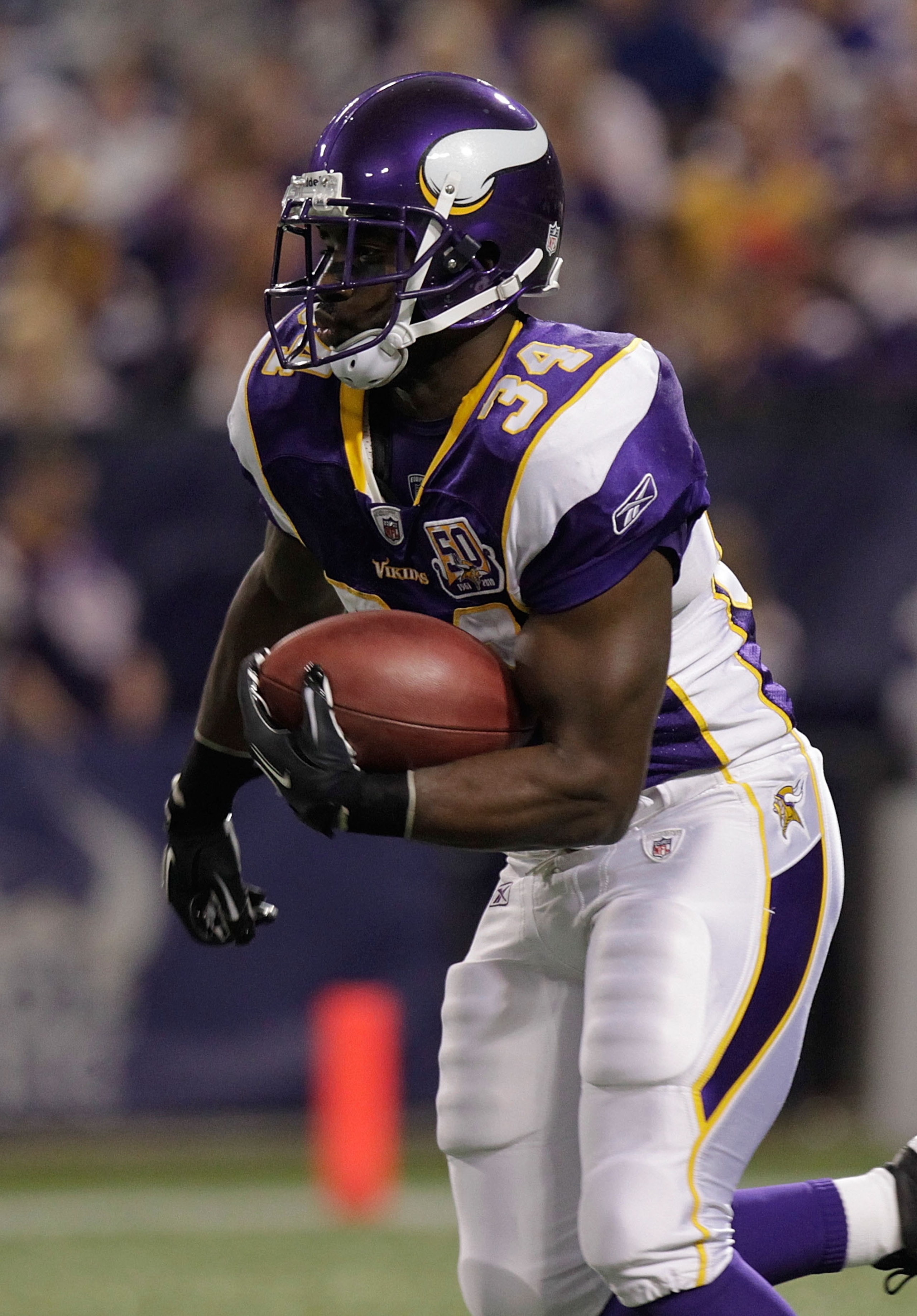 MINNEAPOLIS, MN - DECEMBER 05:  Albert Young #34 of the Minnesota Vikings rushes against  the Buffalo Bills at the Mall of America Field at the Hubert H. Humphrey Metrodome on December 5, 2010 in Minneapolis, Minnesota.  (Photo by Nick Laham/Getty Images)