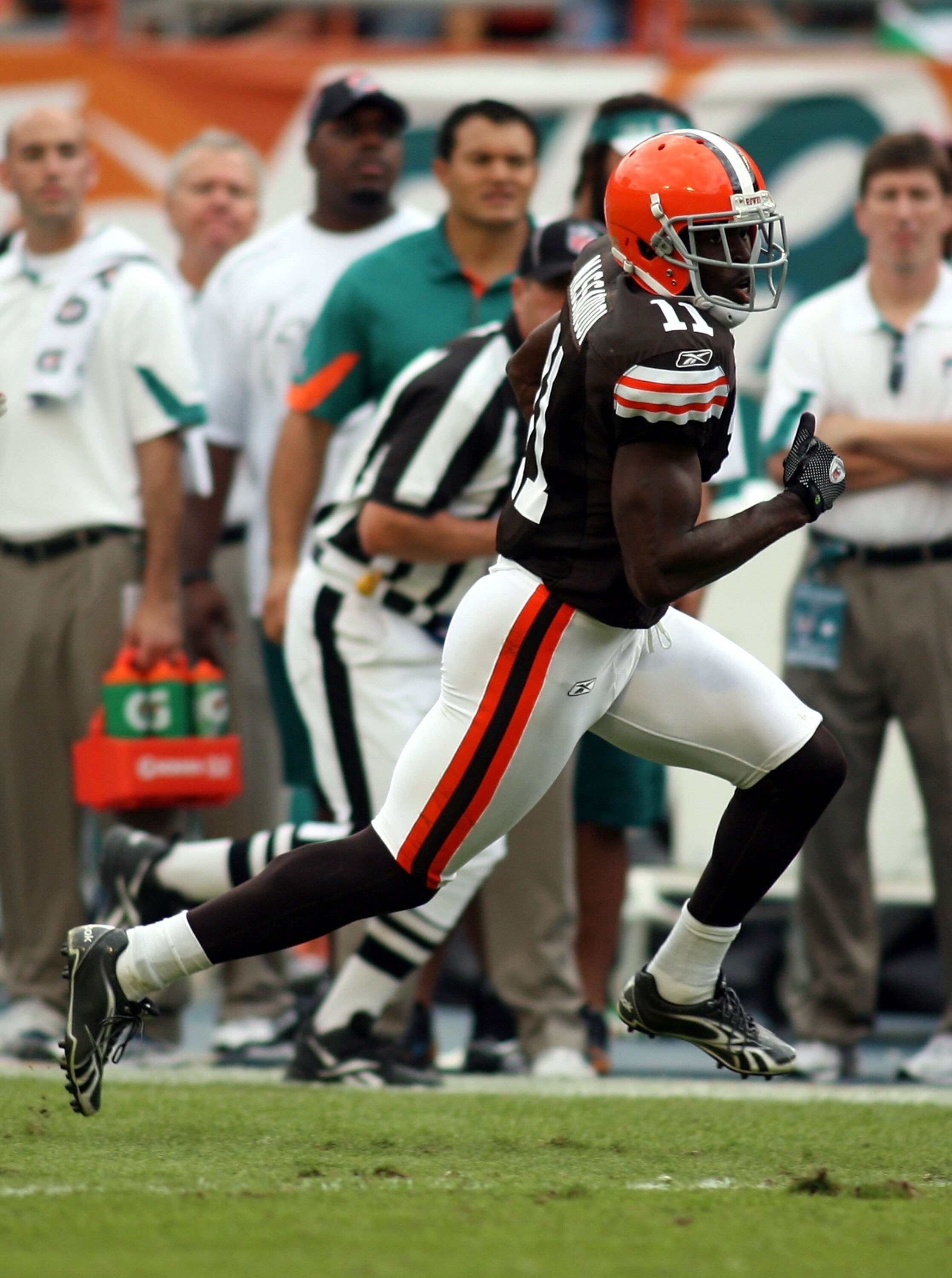 MIAMI, FL - DECEMBER 05:  Receiver Mohamed Massaquoi #11 of the Cleveland Browns runs against the Miami Dolphins at Sun Life Stadium on December 5, 2010 in Miami, Florida.  Cleveland defeated Miami 13-10.  (Photo by Marc Serota/Getty Images)