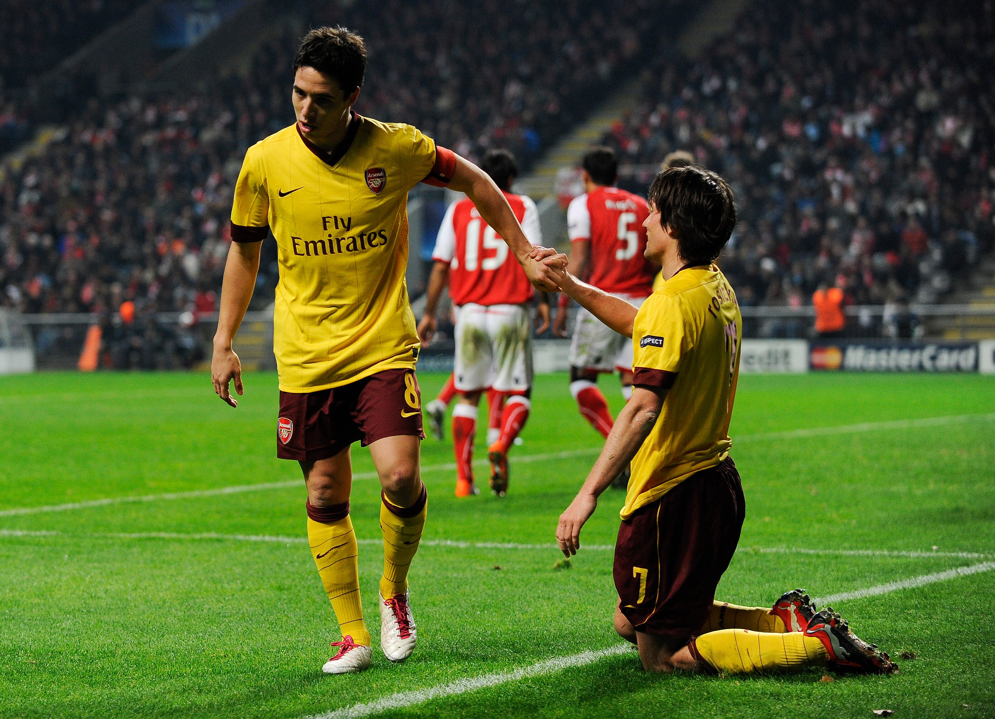 BRAGA, PORTUGAL - NOVEMBER 23:  Samir Nasri of Arsenal (L) and his teammate Tomas Rosicky shake hands during the UEFA Champions League Group H match between SC Braga and Arsenal at Estadio Municipal de Braga on November 23, 2010 in Braga, Portugal.  SC Br
