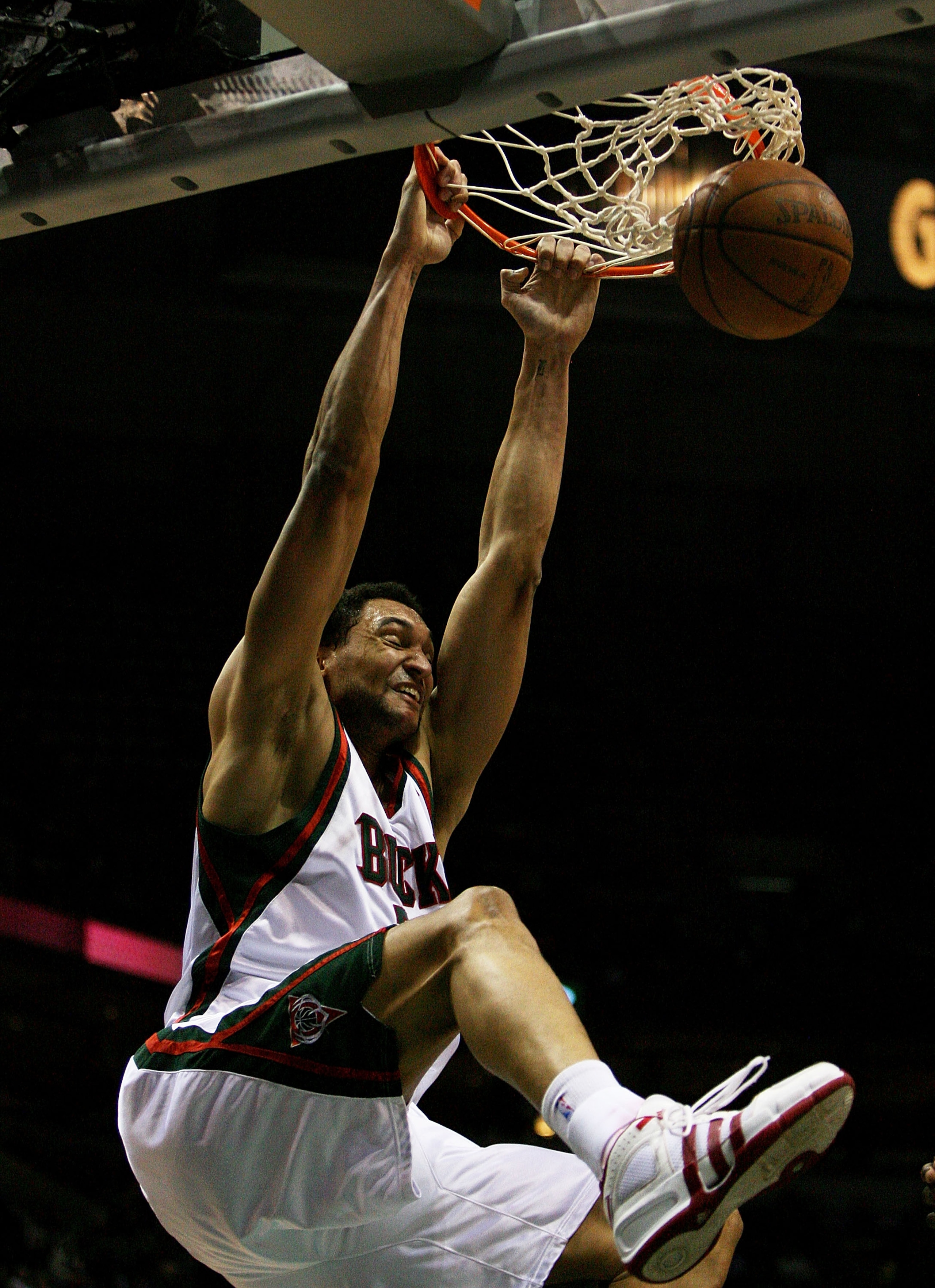 MILWAUKEE - FEBRUARY 09: Dan Gadzuric #50 of the Milwaukee Bucks dunks the ball against the Houston Rockets on February 9, 2009 at the Bradley Center in Milwaukee, Wisconsin. The Bucks defeated the Rockets 124-112. NOTE TO USER: User expressly acknowledge