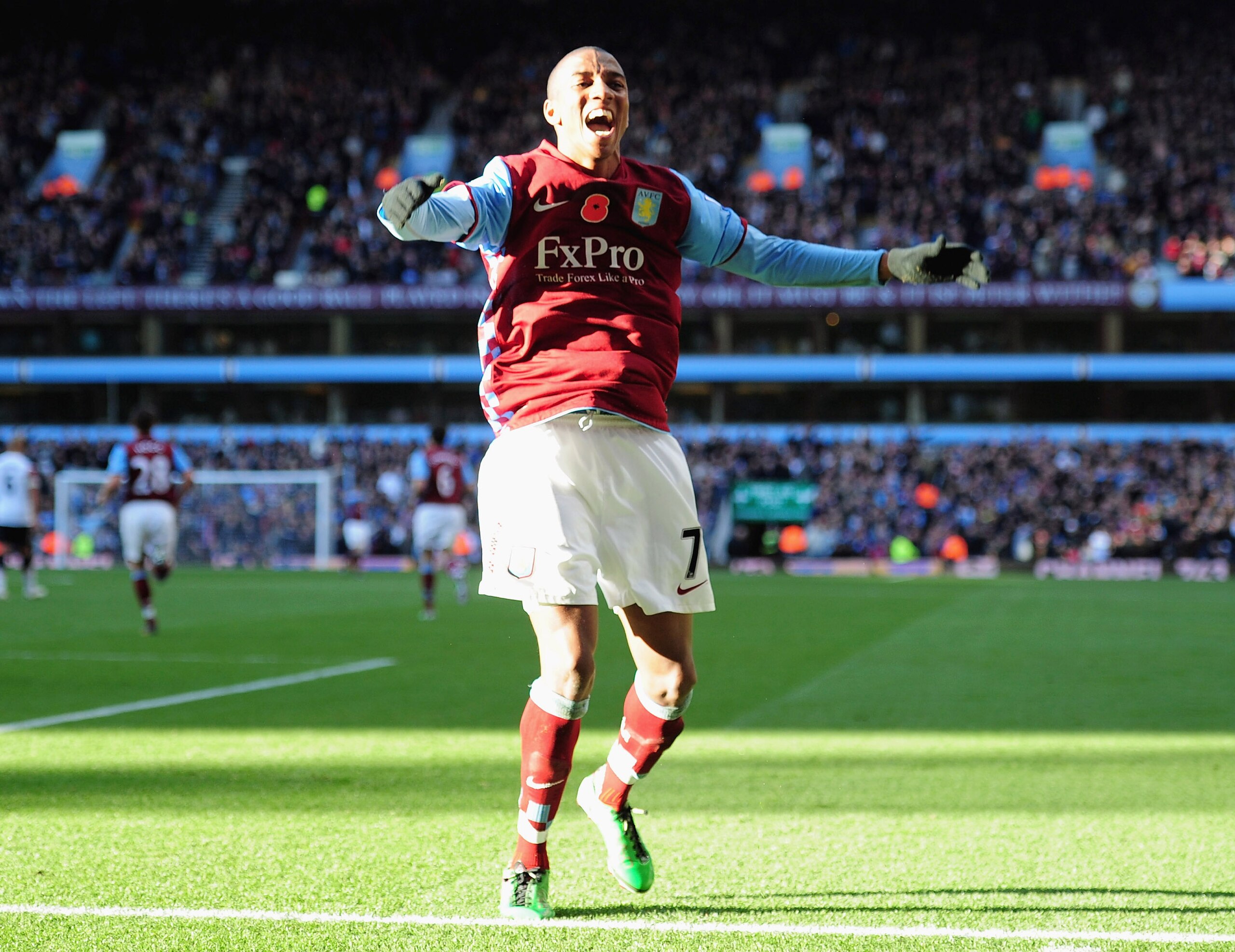 BIRMINGHAM, ENGLAND - NOVEMBER 13:  Ashley Young of Aston Villa celebrates after scoring the opening goal during the Barclays Premier League match between Aston Villa and Manchester United at Villa Park on November 13, 2010 in Birmingham, England.  (Photo