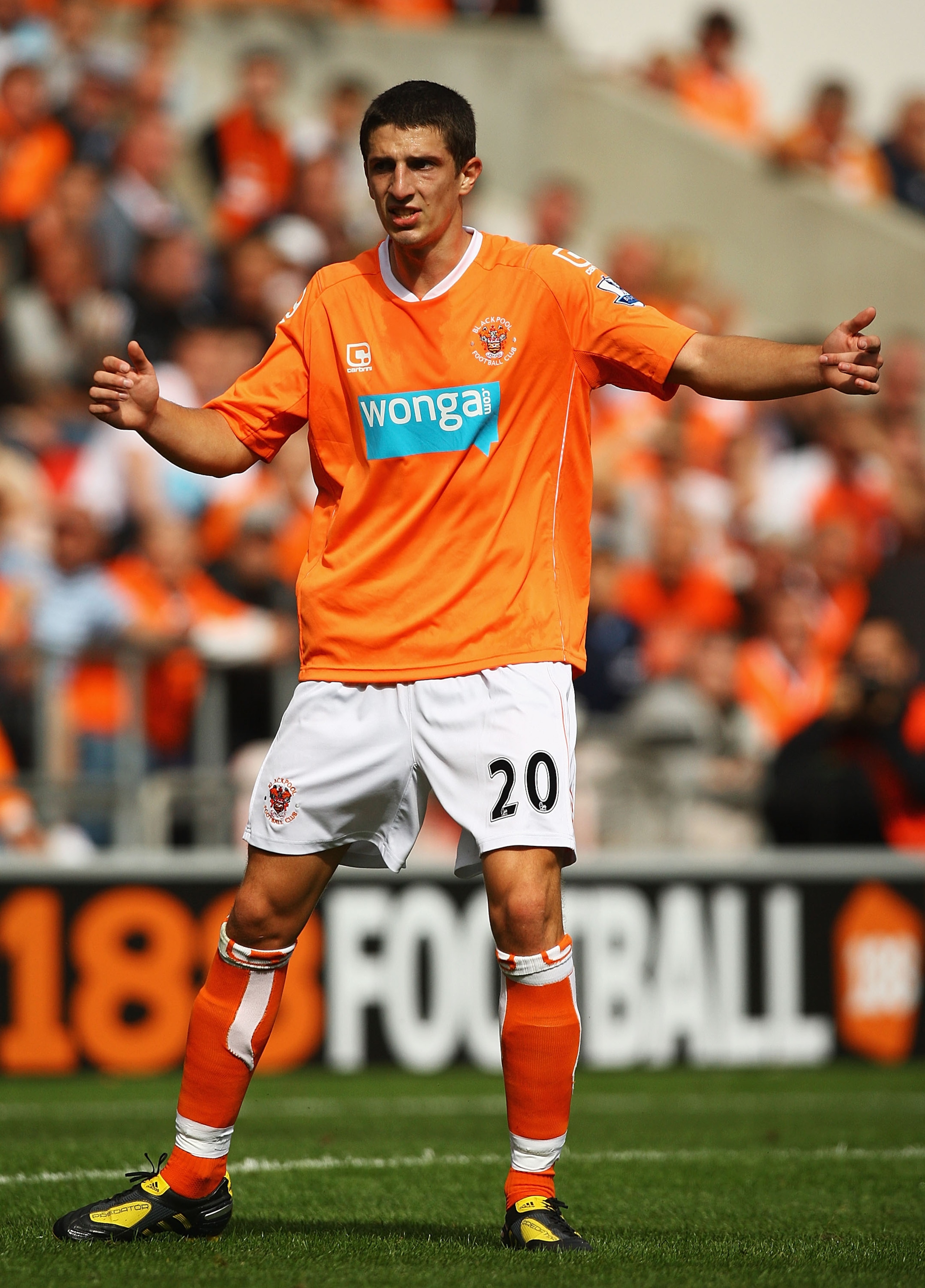 BLACKPOOL, ENGLAND - AUGUST 28:  Craig Cathcart of Blackpool in action during the Barclays Premier League match between Blackpool and Fulham at Bloomfield Road on August 28, 2010 in Blackpool, England.  (Photo by Matthew Lewis/Getty Images)