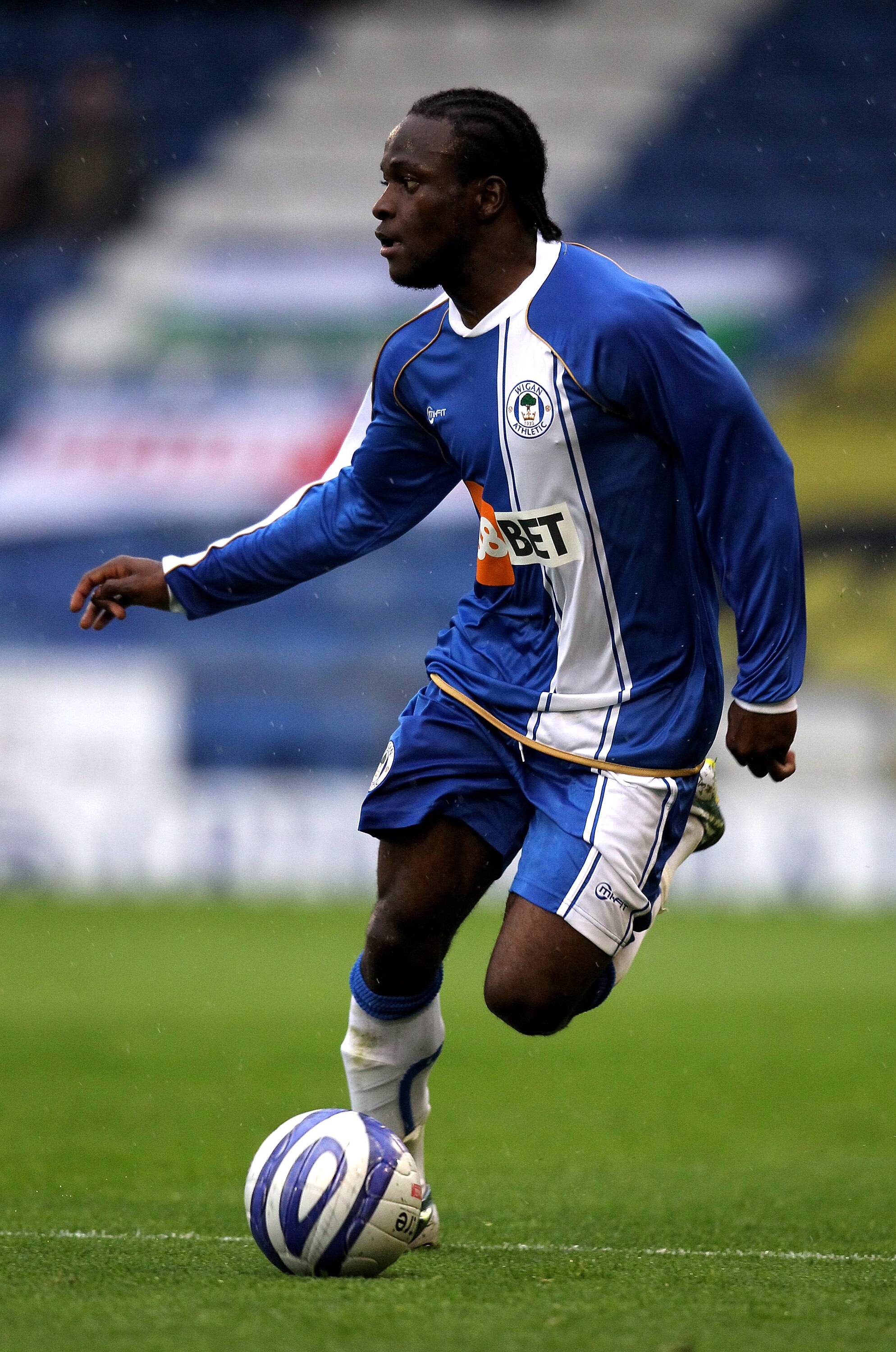 OLDHAM, ENGLAND - JULY 20:  Victor Moses of Wigan runs with the ball during the pre season friendly match between Oldham Athletic and Wigan Athletic at Boundary Park on July 20, 2010 in Oldham, England.  (Photo by David Rogers/Getty Images)