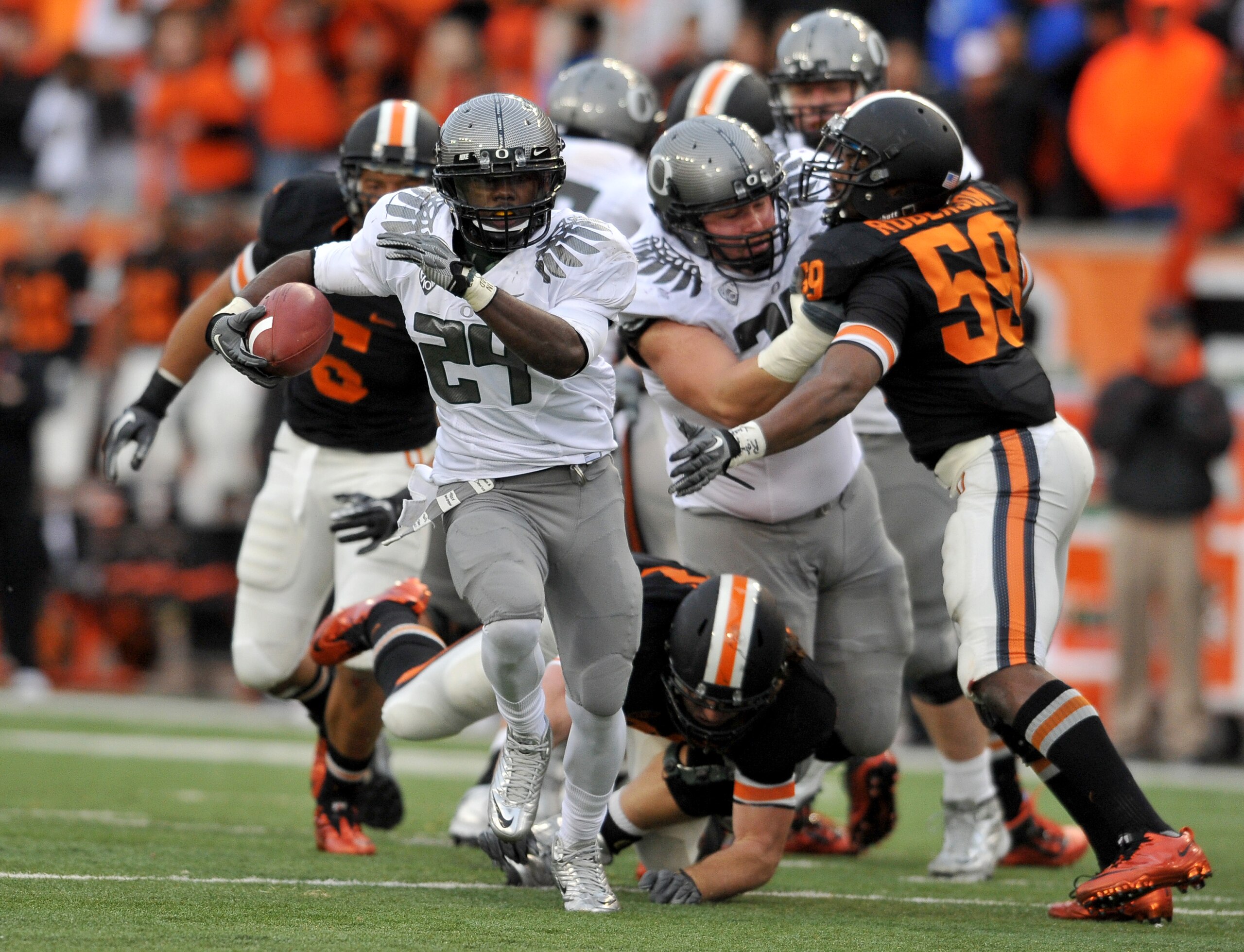 CORVALLIS, OR - DECEMBER 4: Running back Kenjon Barner #24 of the Oregon Ducks heads for the end zone and a touchdown in the fourth quarter of the game against the Oregon State Beavers at Reser Stadium on December 4, 2010 in Corvallis, Oregon. The Ducks b