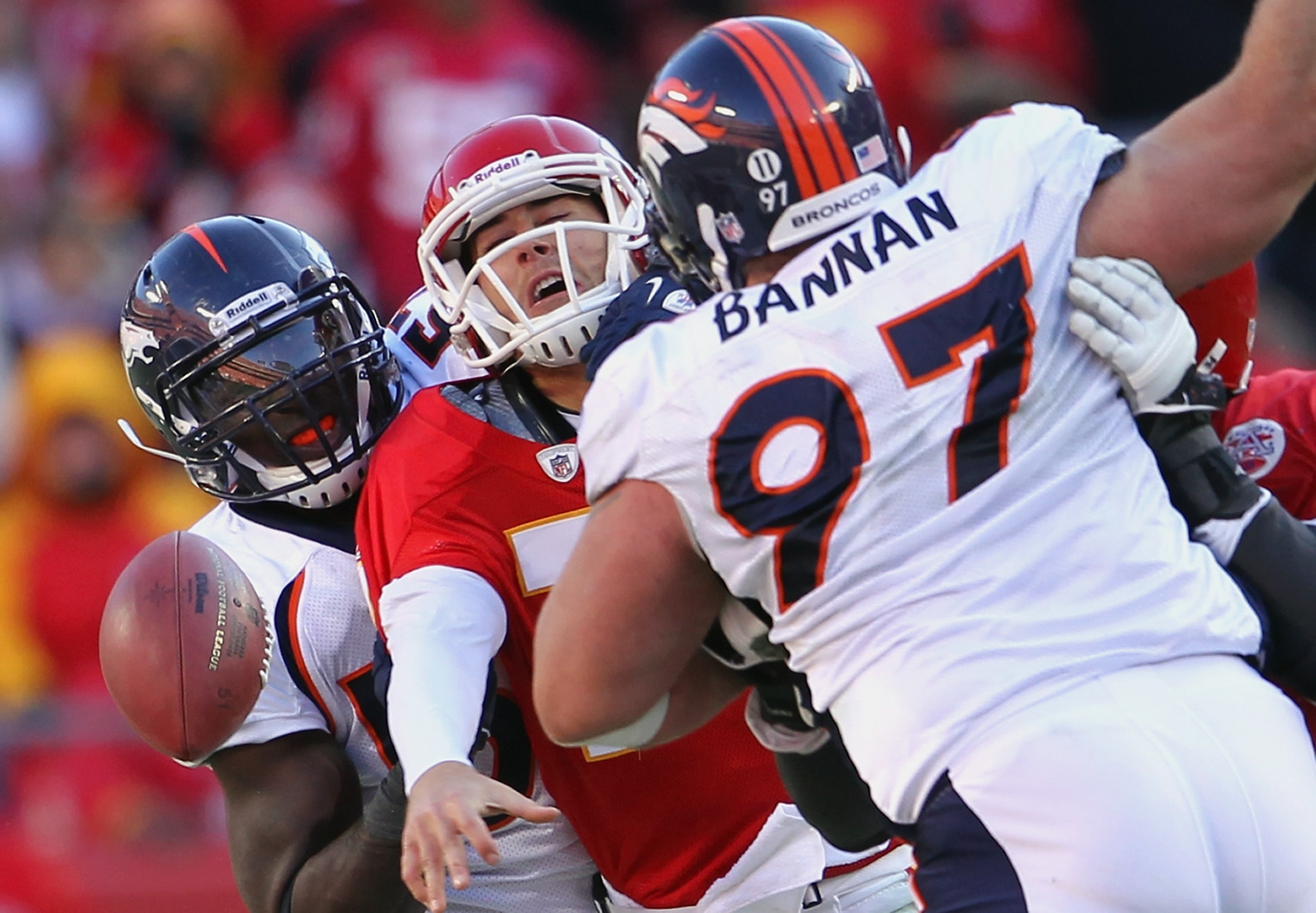 KANSAS CITY, MO - DECEMBER 05: Quarterback Matt Cassel #7 of the Kansas City Chiefs loses the ball as he is pressured by Mario Haggan #57 and Justin Bannan #97 of the Denver Broncos during the game on December 5, 2010 at Arrowhead Stadium in Kansas City, KANSAS CITY, MO - DECEMBER 05: Quarterback Matt Cassel #7 of the Kansas City Chiefs loses the ball as he is pressured by Mario Haggan #57 and Justin Bannan #97 of the Denver Broncos during the game on December 5, 2010 at Arrowhead Stadium in Kansas City,
