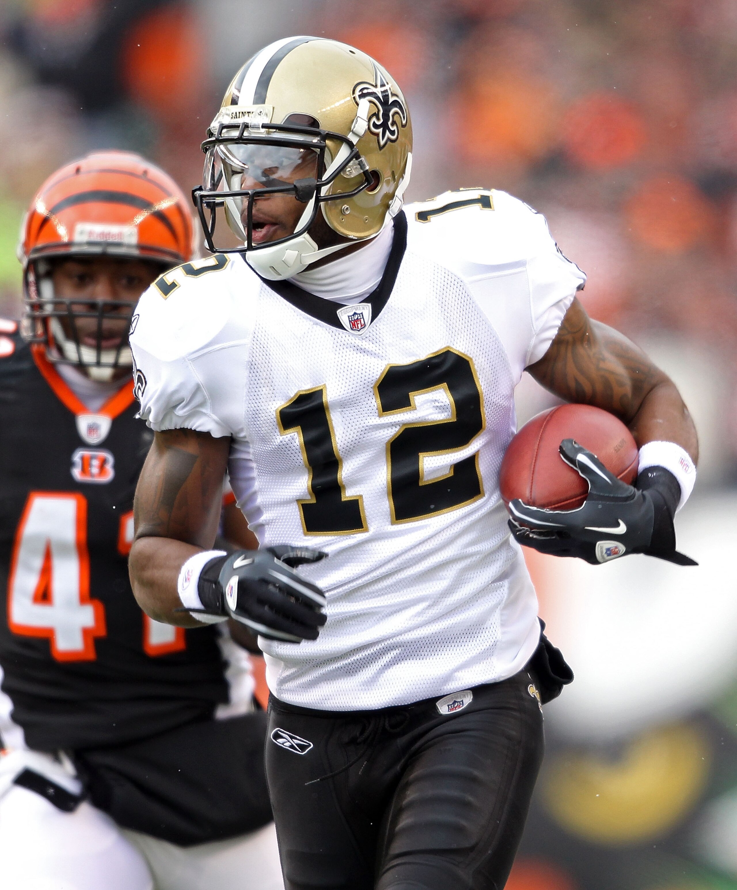 CINCINNATI, OH - DECEMBER 05:  Marques Colston #12 of the New Orleans Saints runs with the ball during the NFL game against the Cincinnati Bengals at Paul Brown Stadium on December 5, 2010 in Cincinnati, Ohio.  The Saints won 34-30.  (Photo by Andy Lyons/