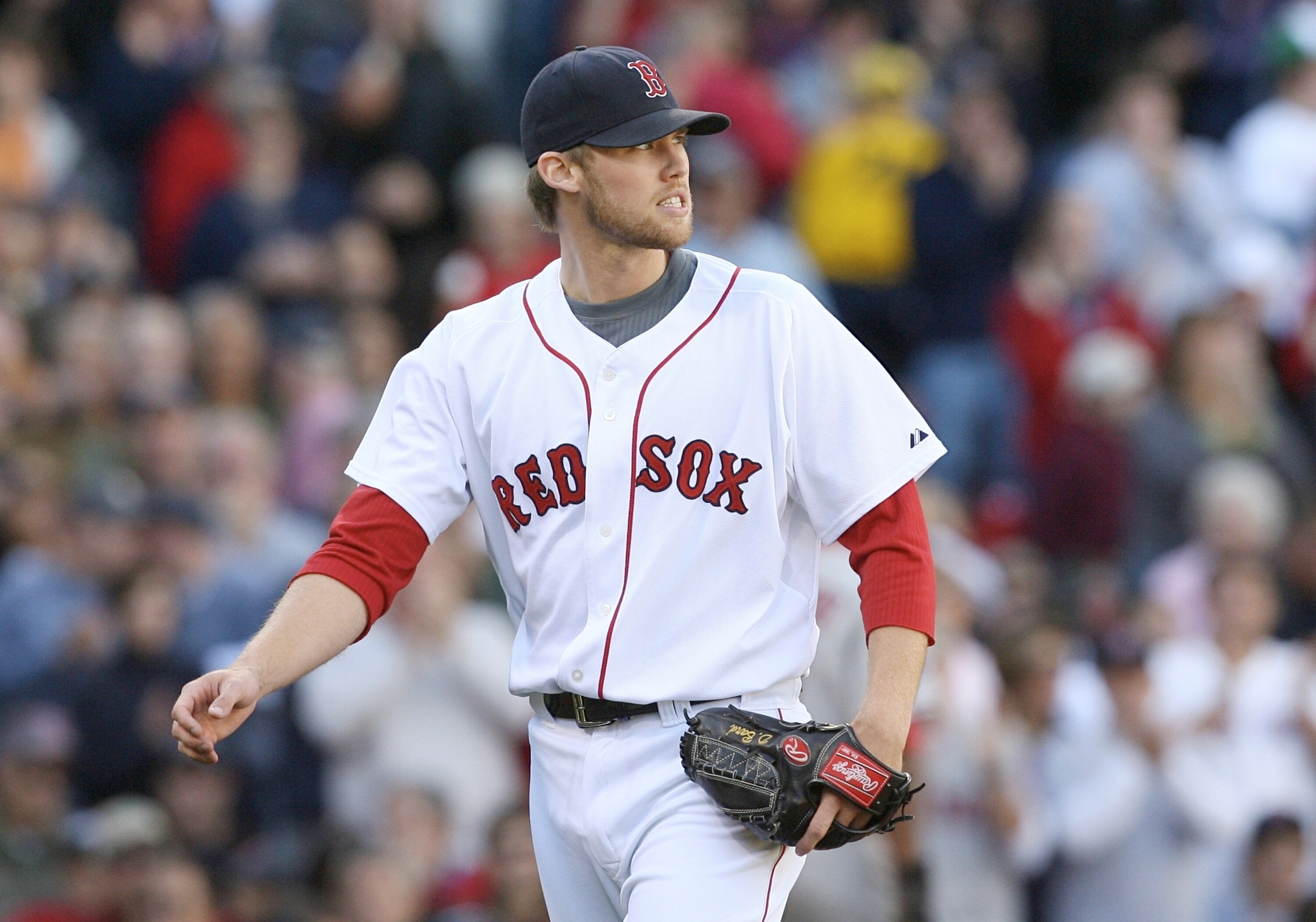 BOSTON - OCTOBER 11: Pitcher Daniel Bard #60 of the Boston Red Sox reacts after getting a double-play in the sixth inning against the Los Angeles Angels of Anaheim in Game Three of the ALDS during the 2009 MLB Playoffs at Fenway Park on October 11, 2009 i