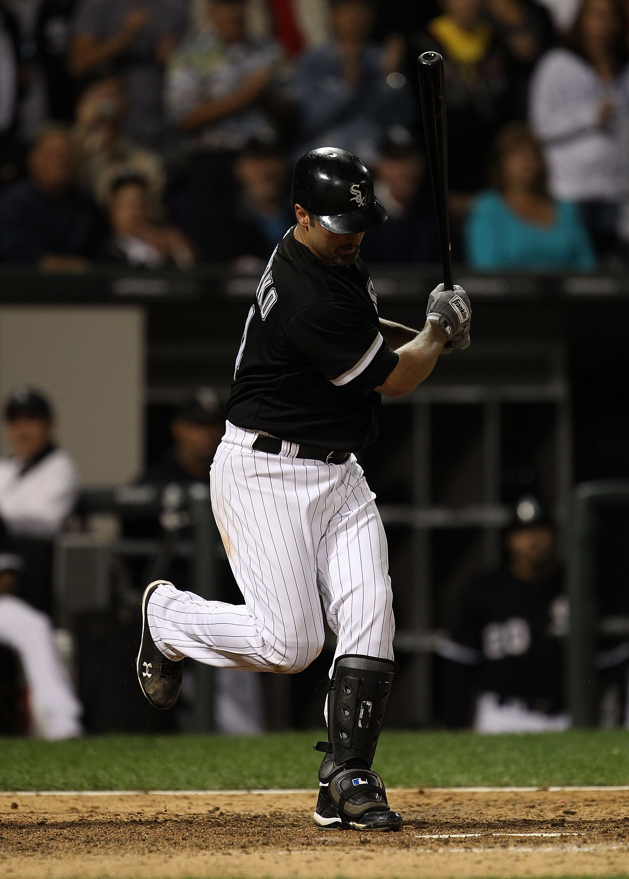 CHICAGO - SEPTEMBER 14: Paul Konerko #14 of the Chicago White Sox strikes out with the bases loaded in the 7th inning against the Minnesota Twins at U.S. Cellular Field on September 14, 2010 in Chicago, Illinois. The Twins defeated the White Sox 9-3. (Pho