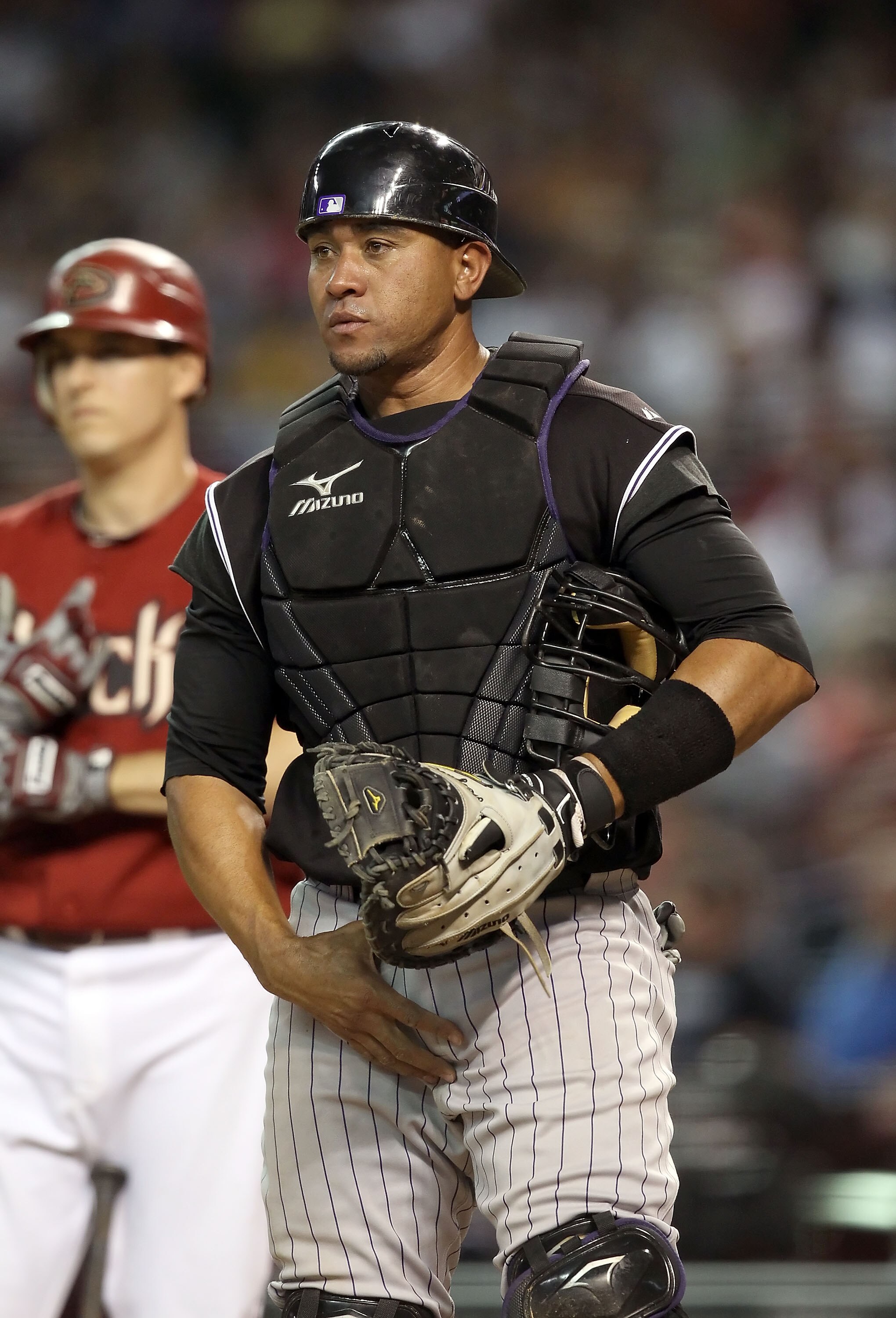PHOENIX - SEPTEMBER 22:  Catcher Miguel Olivo of the Colorado Rockies during the Major League Baseball game against the Arizona Diamondbacks at Chase Field on September 22, 2010 in Phoenix, Arizona.  (Photo by Christian Petersen/Getty Images)
