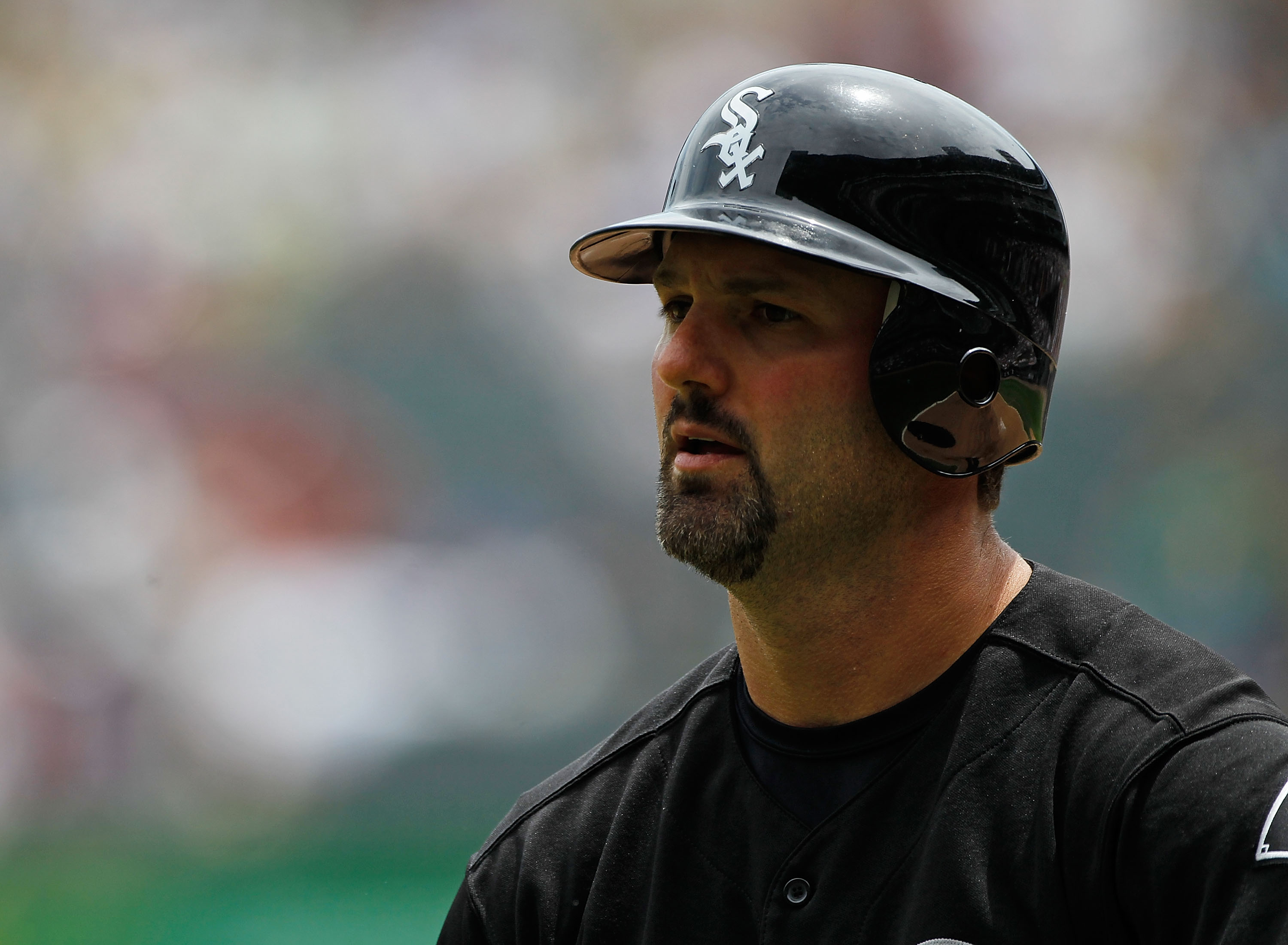 CHICAGO - JUNE 10: Paul Konerko #14 of the Chicago White Sox walks back to the dugout against the Detriot Tigers at U.S. Cellular Field on June 10, 2010 in Chicago, Illinois. The White Sox defeated the Tigers 3-0. (Photo by Jonathan Daniel/Getty Images)