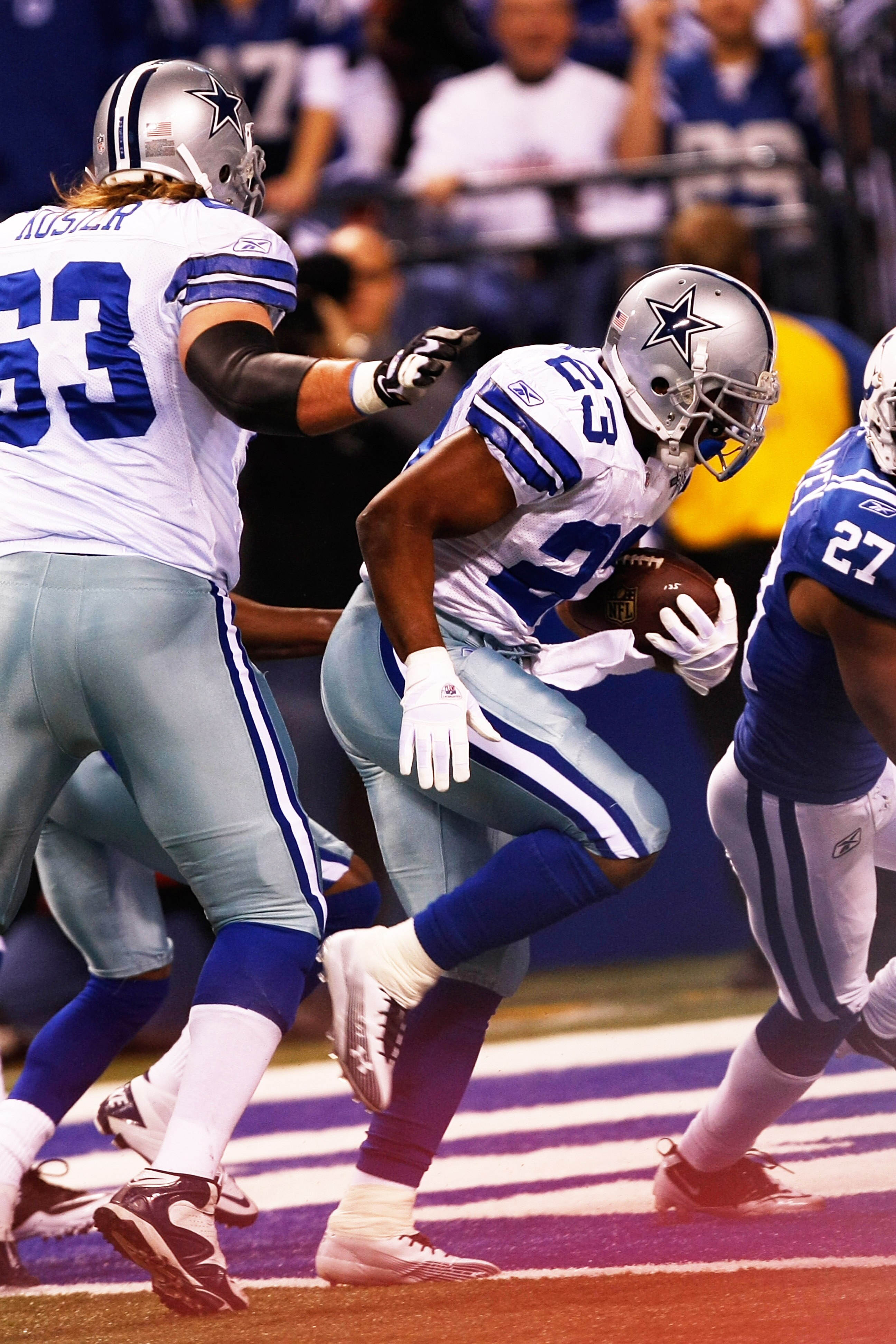 INDIANAPOLIS, IN - DECEMBER 05: Tashard Choice #23 of the Dallas Cowboys runs in the end zone for a touchdown in the 1st quarter against the Indianapolis Colts at Lucas Oil Stadium on December 5, 2010 in Indianapolis, Indiana.  (Photo by Scott Boehm/Getty