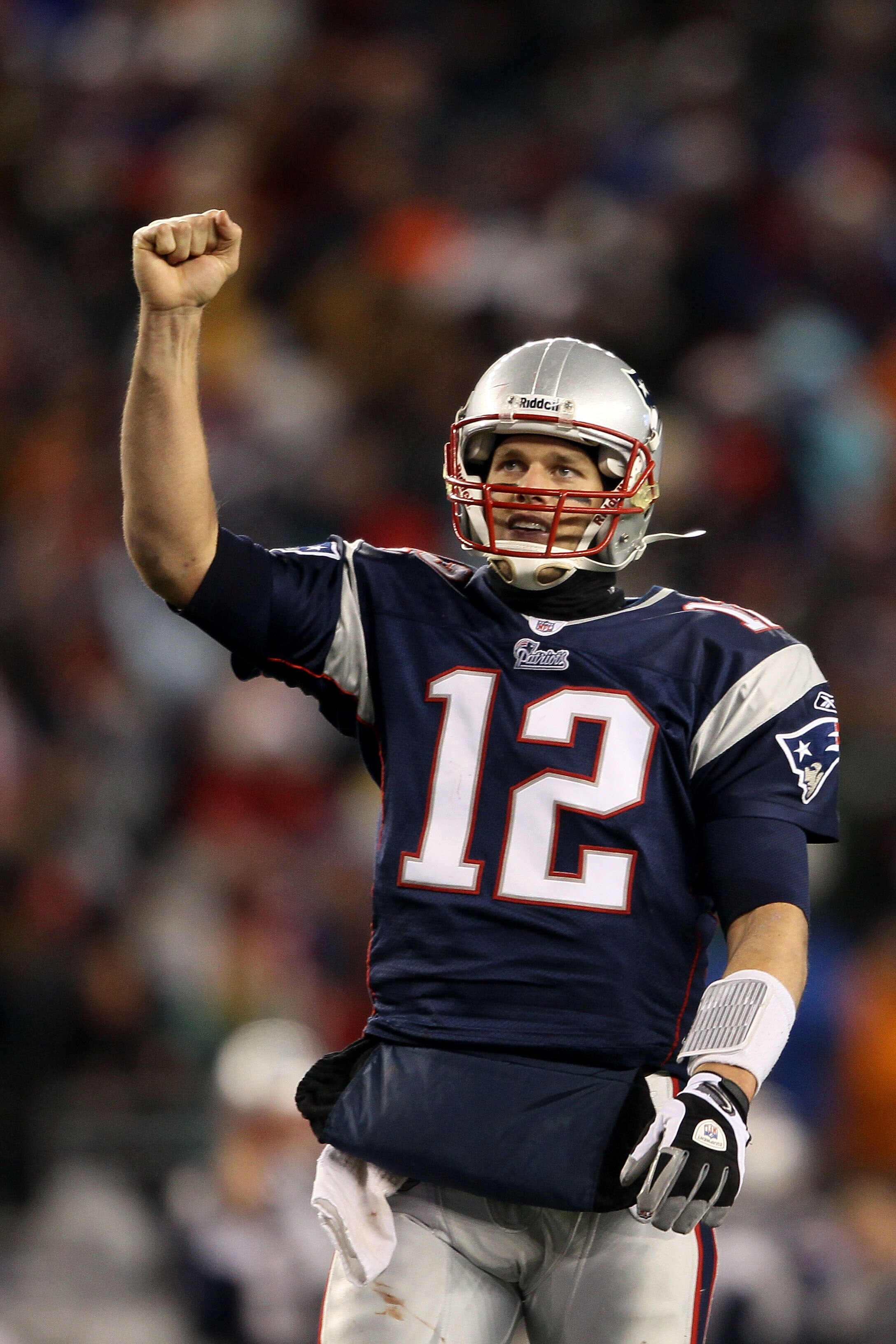 FOXBORO, MA - DECEMBER 06:  Tom Brady #12 of the New England Patriots celebrates after BenJarvus Green-Ellis #42 scored a 5-yard rushing touchdown in the fourth quarter against the New York Jets at Gillette Stadium on December 6, 2010 in Foxboro, Massachu