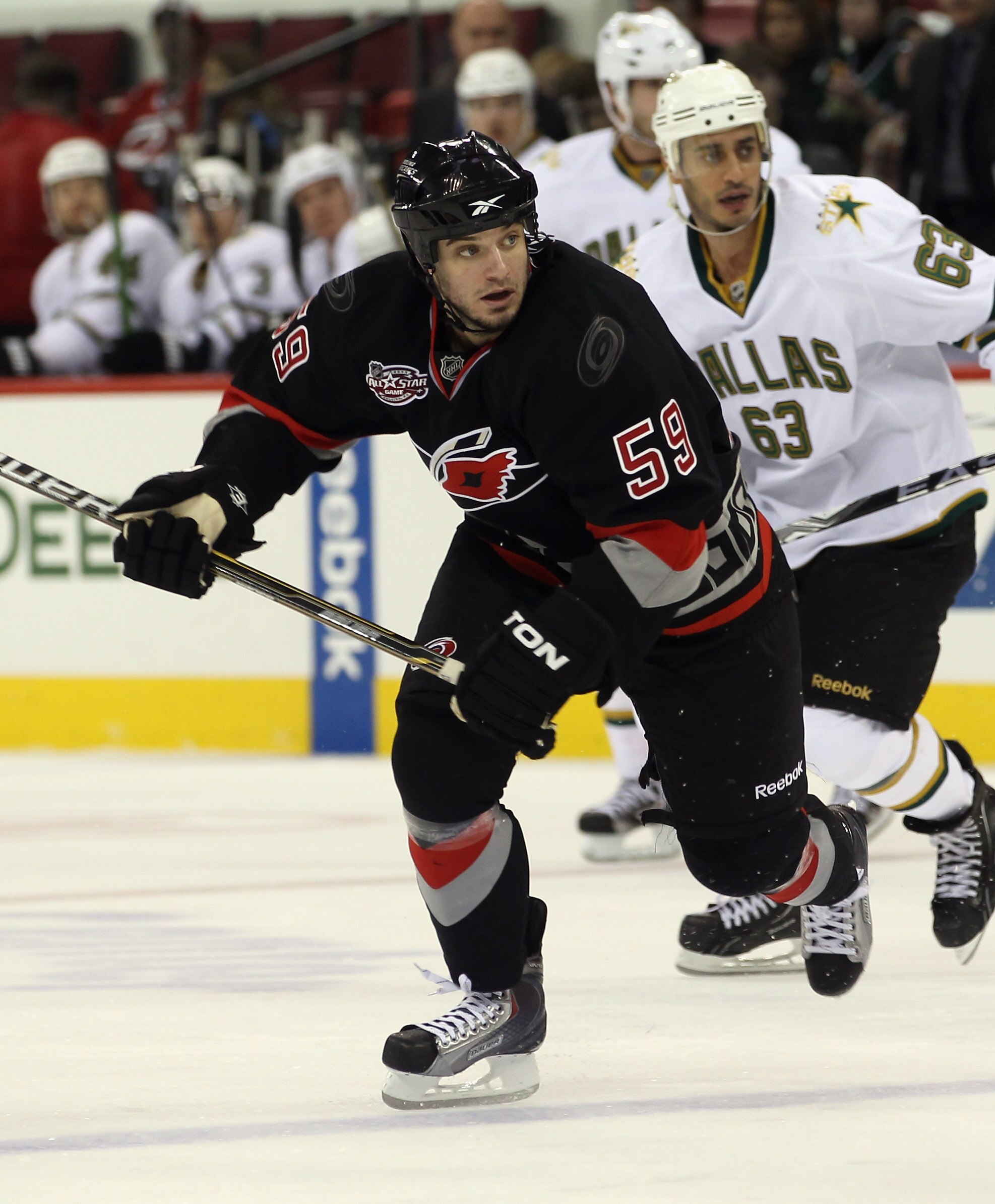 RALEIGH, NC - NOVEMBER 29:  Chad LaRose #59 of the Carolina Hurricanes skates against the Dallas Stars at the RBC Center on November 29, 2010 in Raleigh, North Carolina. The Stars defeated the Hurricanes 4-1.  (Photo by Bruce Bennett/Getty Images)