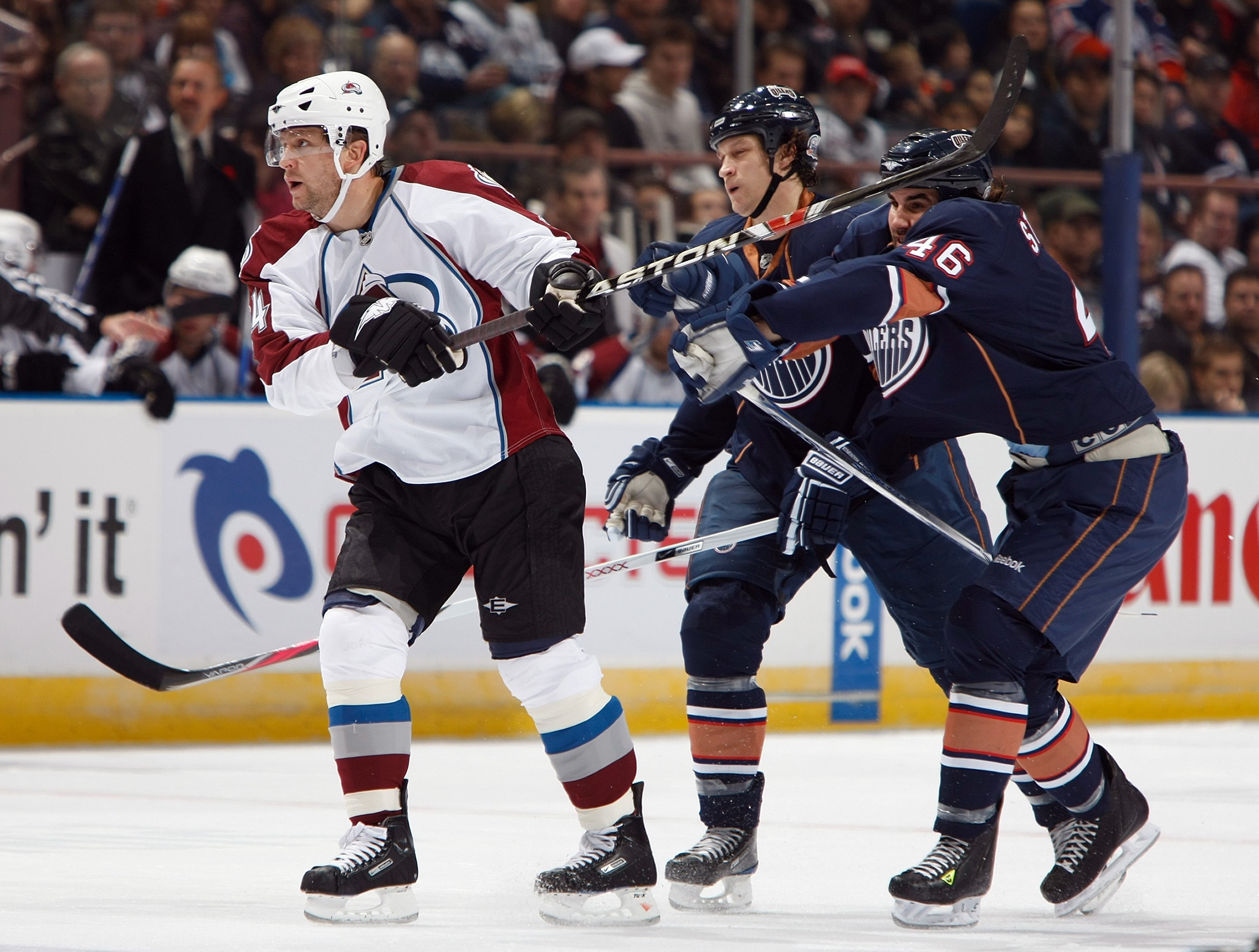 EDMONTON, CANADA - NOVEMBER 15:  Ruslan Salei #24 of the Colorado Avalanche tangles with Zach Stortini #46 of the Edmonton Oilers during their NHL game on November 15, 2008 at Rexall Place in Edmonton, Alberta, Canada. The Avalanche defeated the Oilers 3-