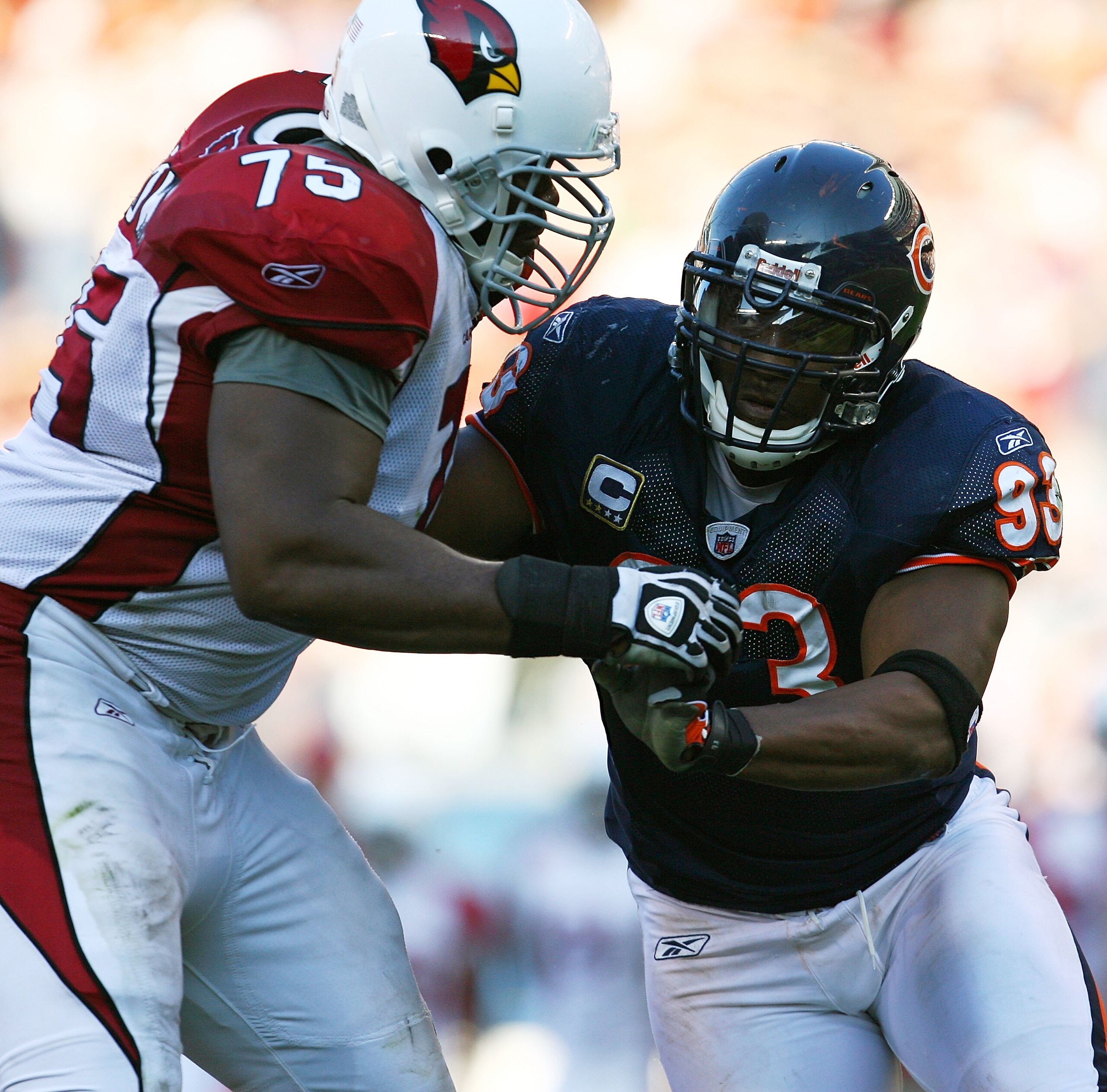 CHICAGO - NOVEMBER 08: Adewale Ogunleye #93 of the Chicago Bears rushes against Levi Brown #75 of the Arizona Cardinals at Soldier Field on November 8, 2009 in Chicago, Illinois. The Cardinals defeated the Bears 41-21. (Photo by Jonathan Daniel/Getty Imag CHICAGO - NOVEMBER 08: Adewale Ogunleye #93 of the Chicago Bears rushes against Levi Brown #75 of the Arizona Cardinals at Soldier Field on November 8, 2009 in Chicago, Illinois. The Cardinals defeated the Bears 41-21. (Photo by Jonathan Daniel/Getty Imag