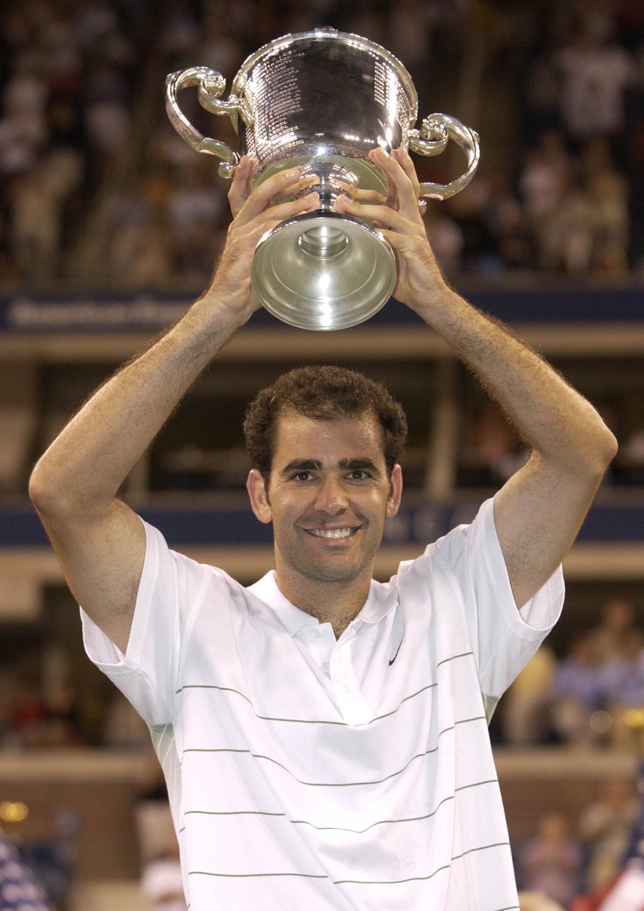 FLUSHING, NY - SEPTEMBER 8: Pete Sampras celebrates his win over Andre Agassi during the finals of the US Open September 8, 2002 at the USTA National Tennis Center in Flushing Meadows Corona Park in Flushing, New York.  (Photo by Ezra Shaw/Getty Images)