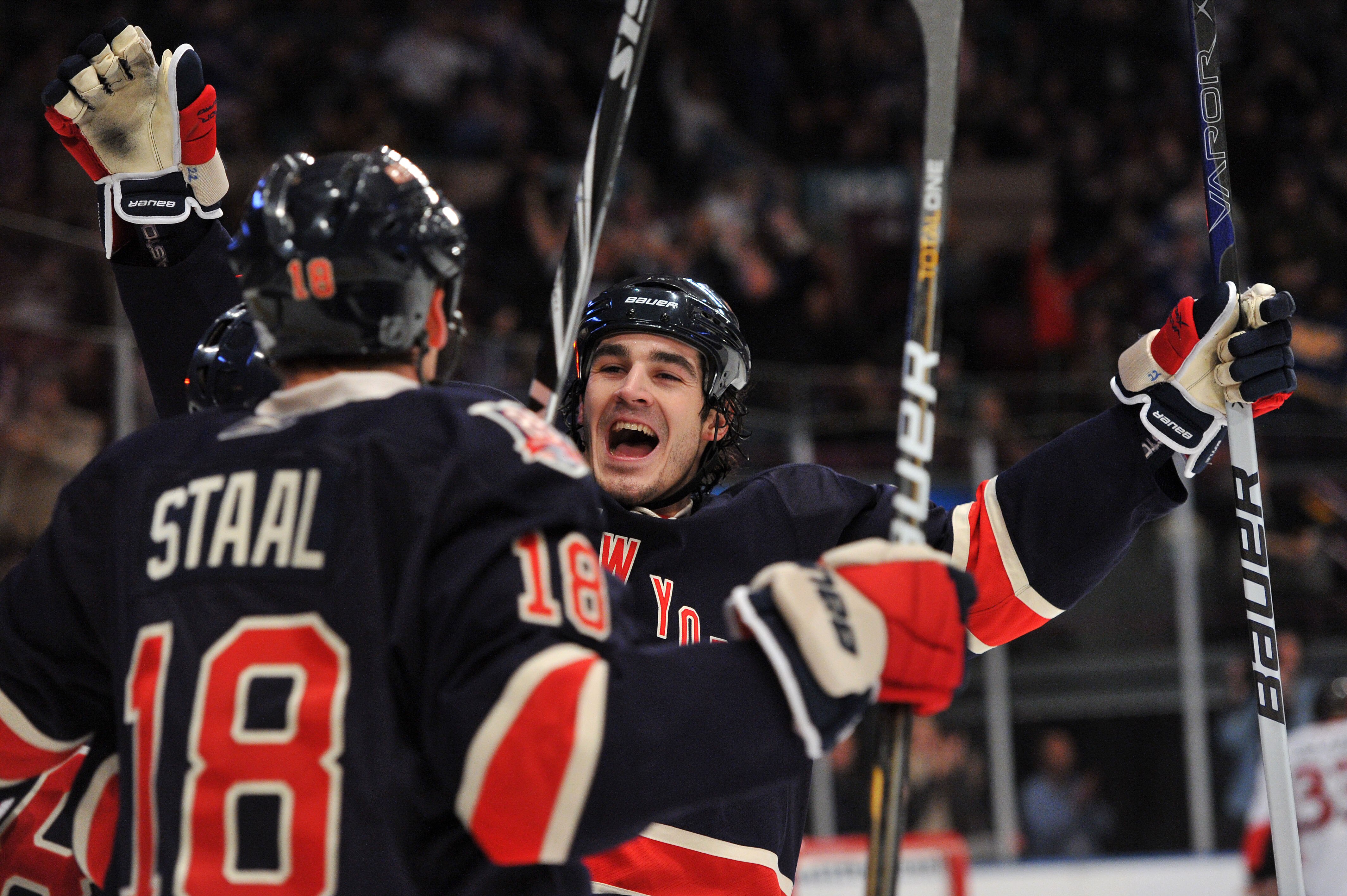 NEW YORK, NY - DECEMBER 5: Brian Boyle #22 of the New York Rangers celebrates assisting on a second period goal by Brandon Prust (not pictured)with Marc Staal #18 of the New York Rangers against the Ottawa Senators at Madison Square Garden on December 5,