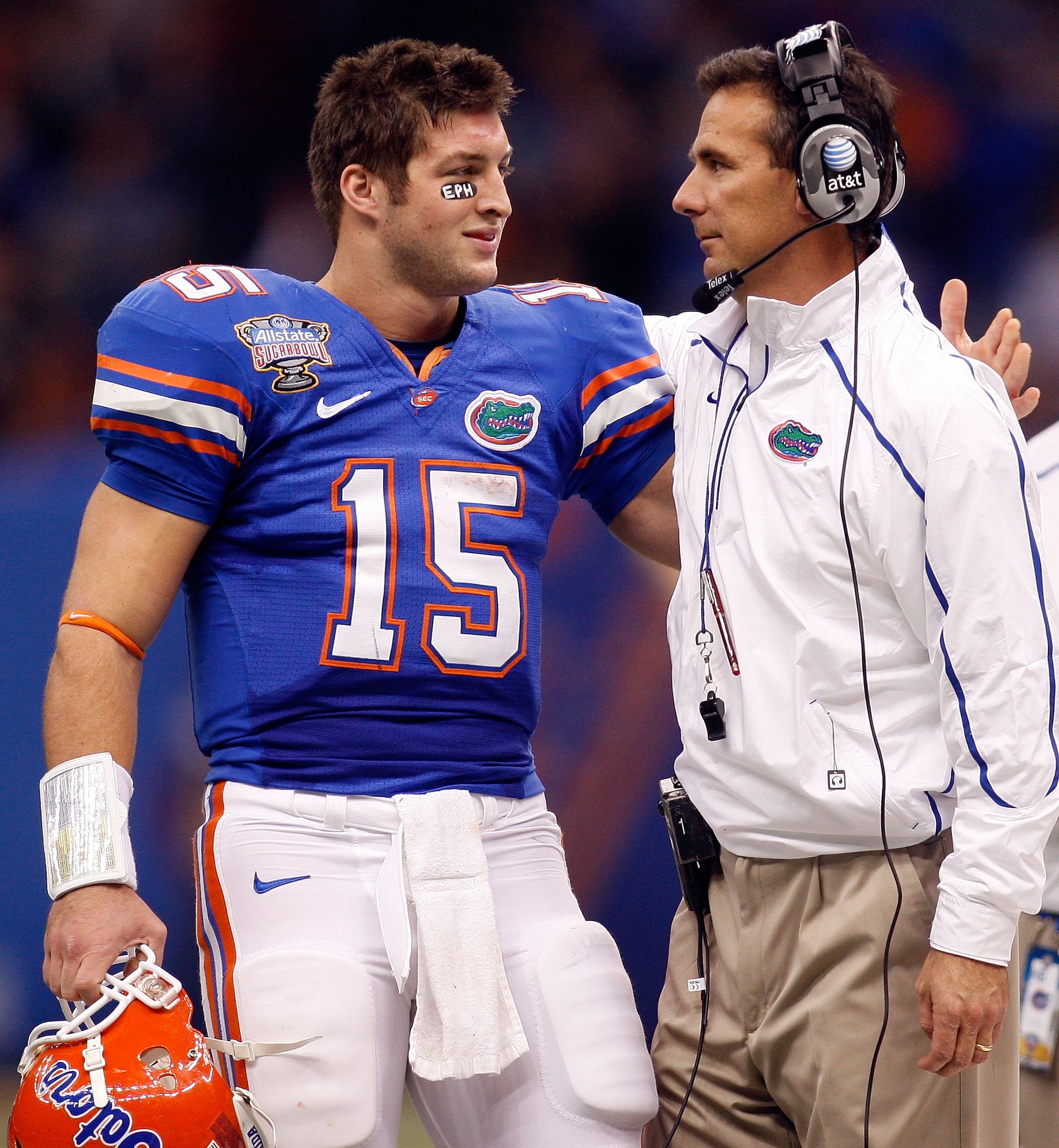 NEW ORLEANS - JANUARY 01:  Quarterback Tim Tebow #15  hugs head coach Urban Meyer of the Florida Gators after scoring a touchdown against the Cincinnati Bearcats during the Allstate Sugar Bowl at the Louisana Superdome on January 1, 2010 in New Orleans, L