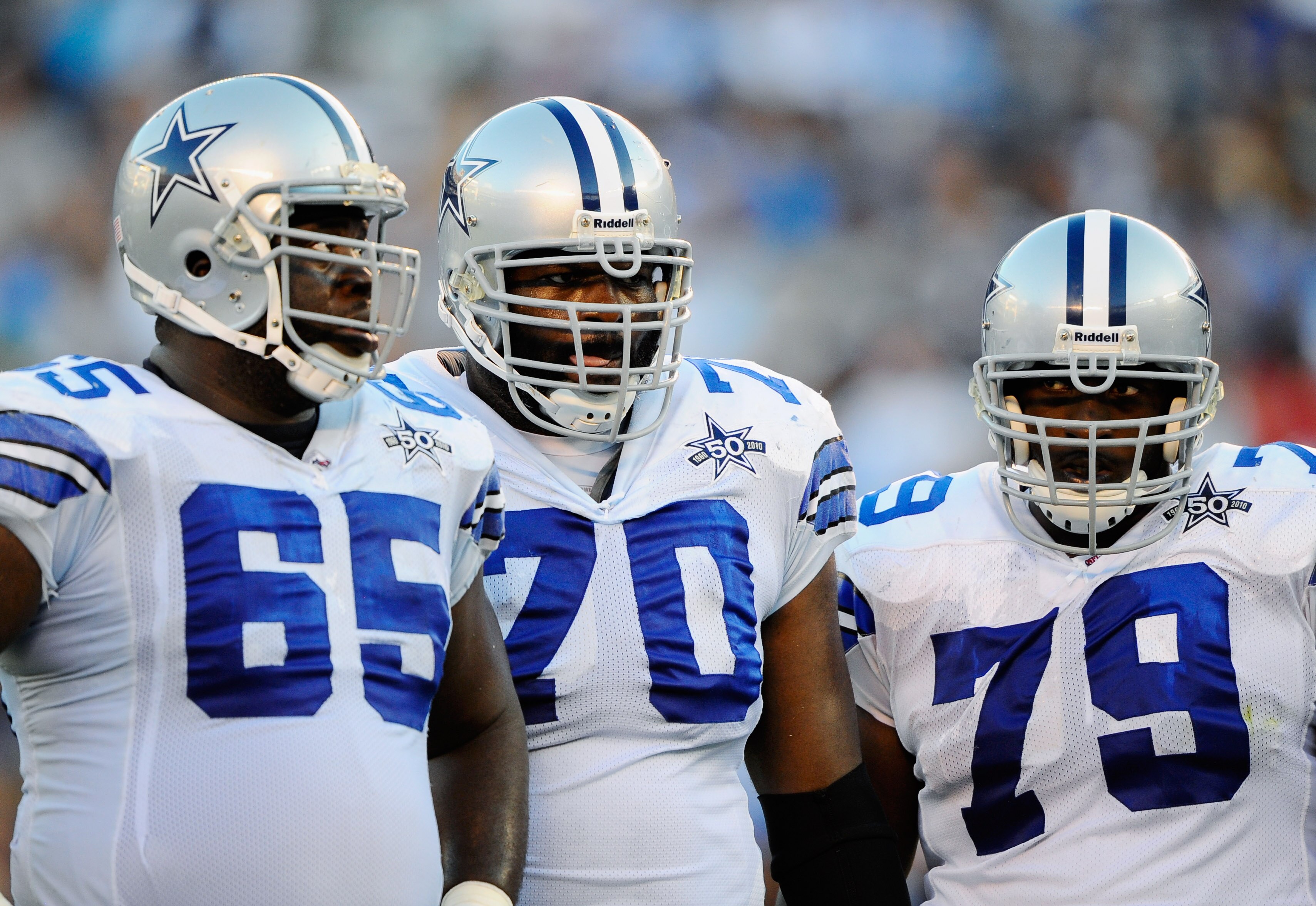 SAN DIEGO - AUGUST 21:  Andre Gurode #65, Leonard Davis #70 and Robert Brewster #79 of the Dallas Cowboys in action during the pre-season NFL football game against San Diego Chargers at Qualcomm Stadium on August 21, 2010 in San Diego, California.  (Photo