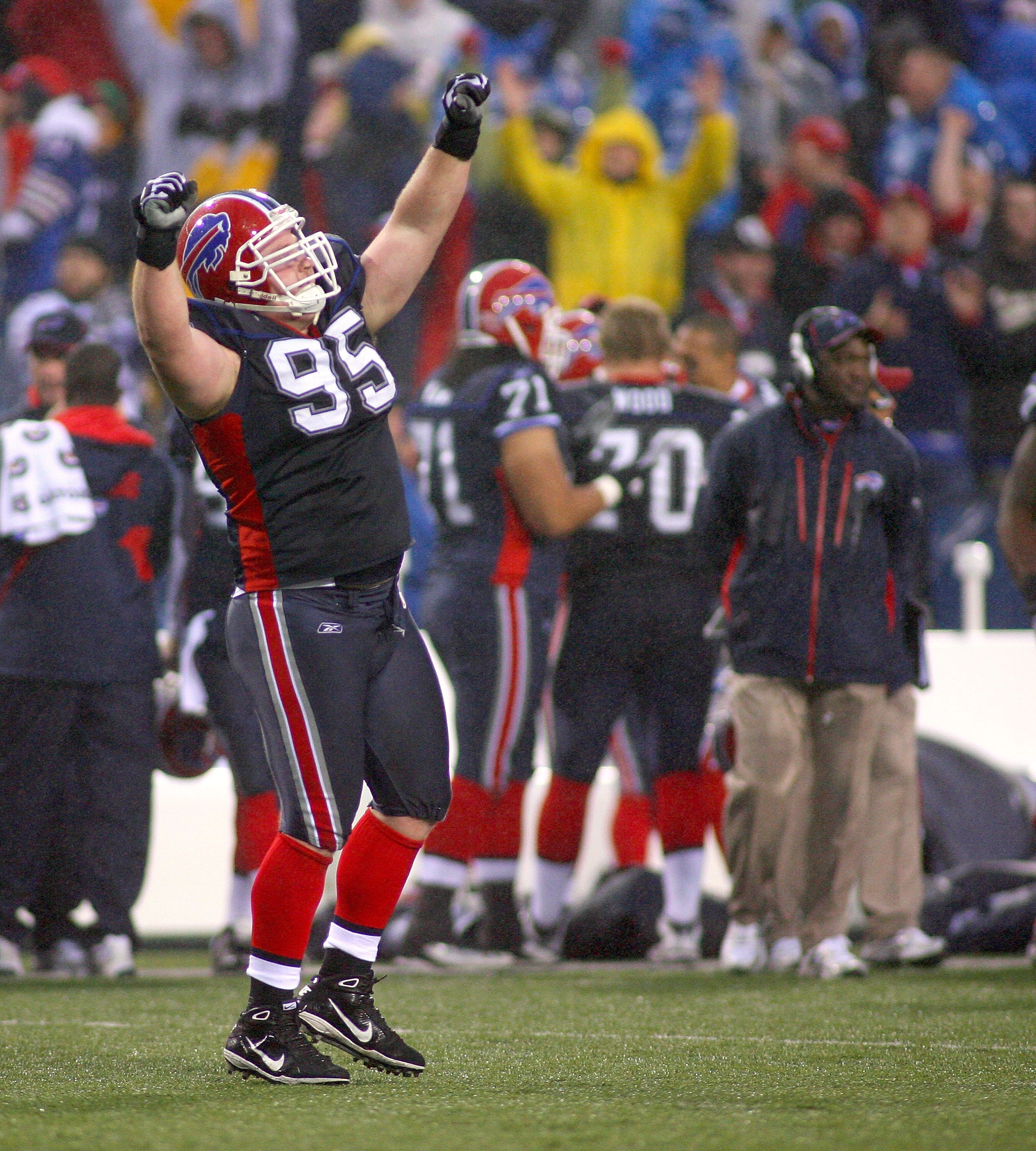 ORCHARD PARK, NY - NOVEMBER 14: Kyle Williams #95 of the Buffalo Bills celebrates after the Bills win their first game of the season against the Detroit Lions at Ralph Wilson Stadium on November 14, 2010 in Orchard Park, New York. Buffalo won 14-12.  (Pho