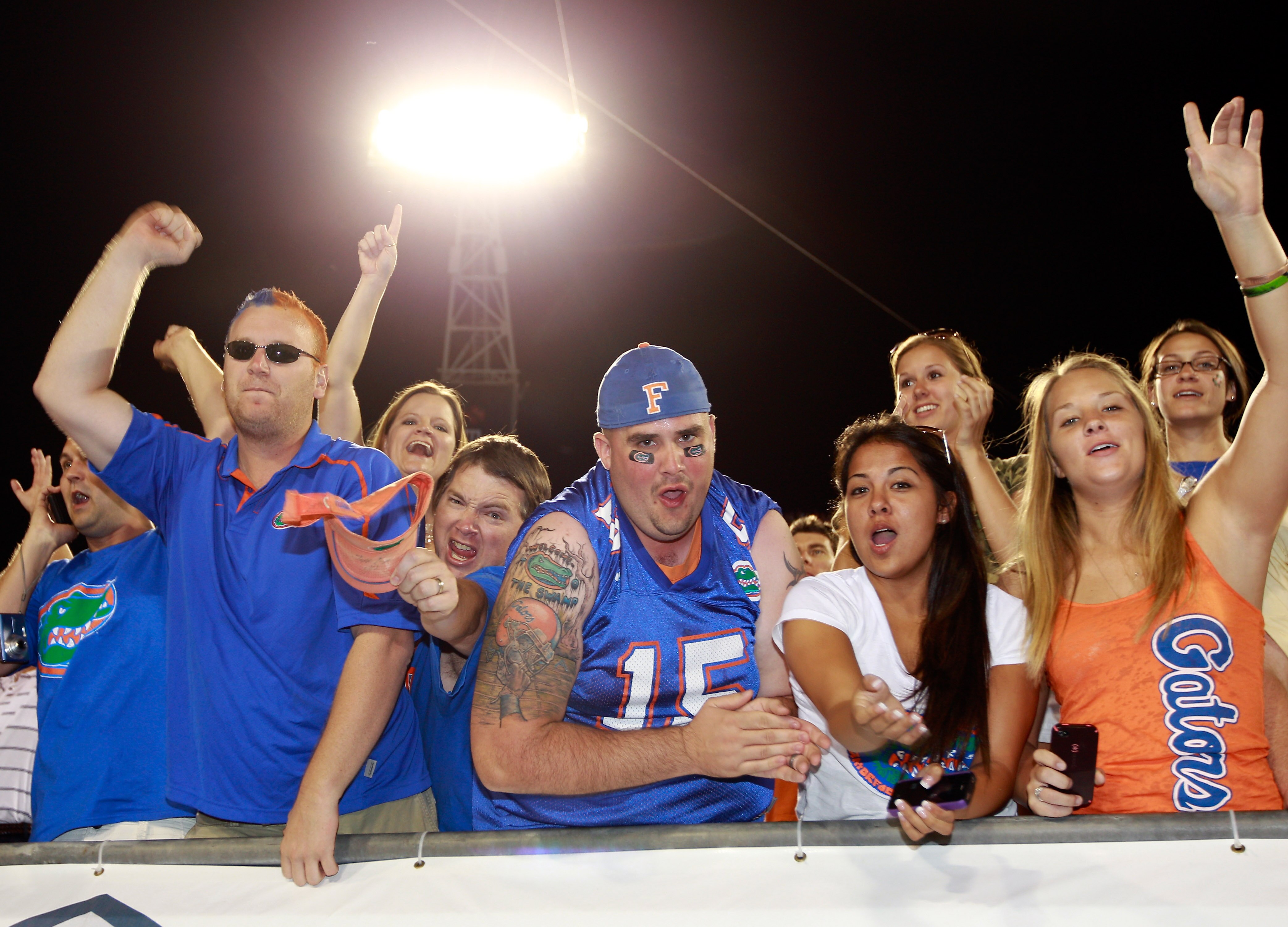 JACKSONVILLE, FL - OCTOBER 30:  Florida Gator fans celebrate following a victory against the Georgia Bulldogs at EverBank Field on October 30, 2010 in Jacksonville, Florida.  (Photo by Sam Greenwood/Getty Images)