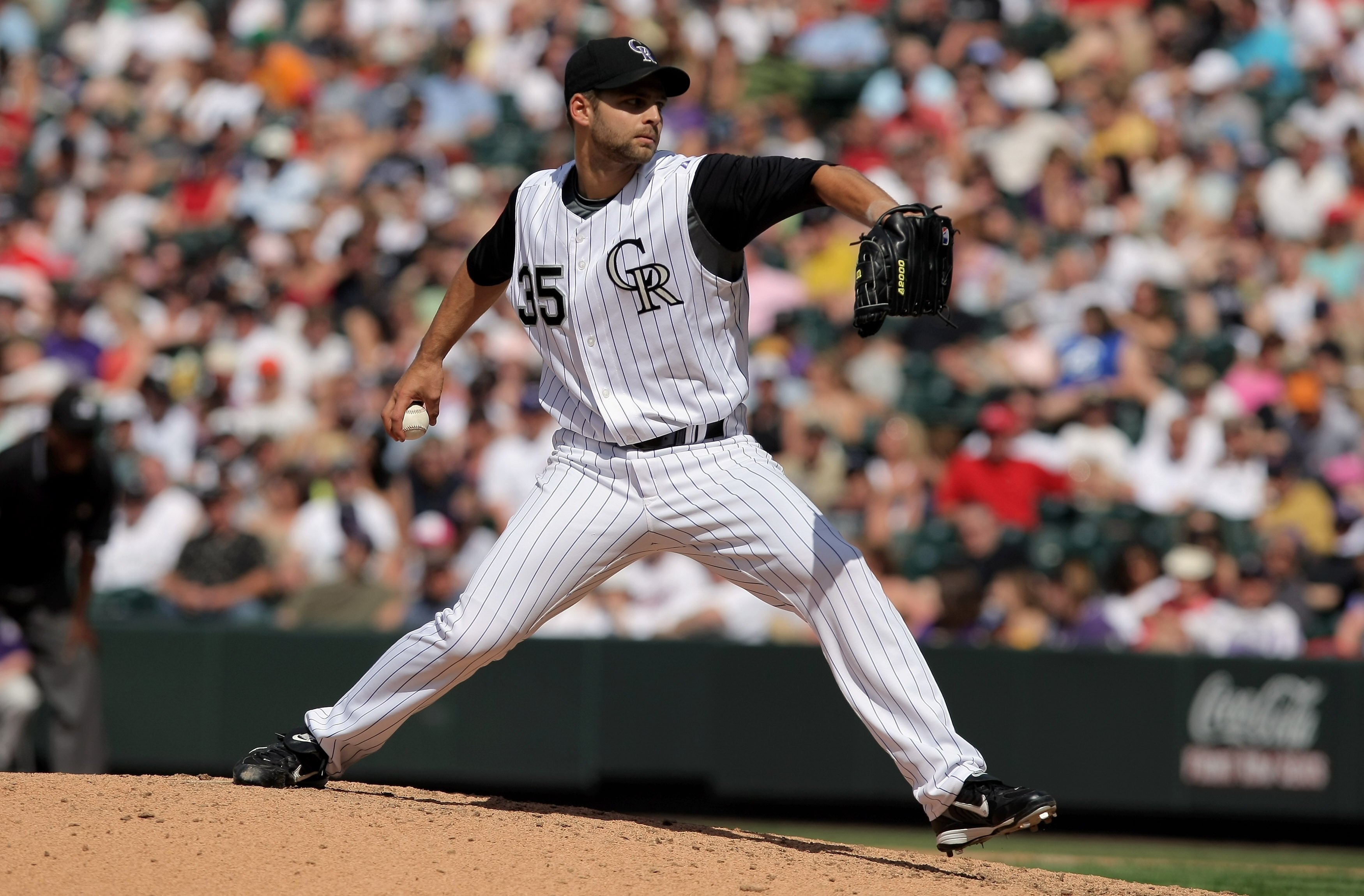 DENVER - MAY 18:  Pitcher Taylor Buchholz #35 of the Colorado Rockies delivers against the Minnesota Twins during Interleague MLB action at Coors Field on May 18, 2008 in Denver, Colorado. The Rockies defeated the Twins 6-2.  (Photo by Doug Pensinger/Gett