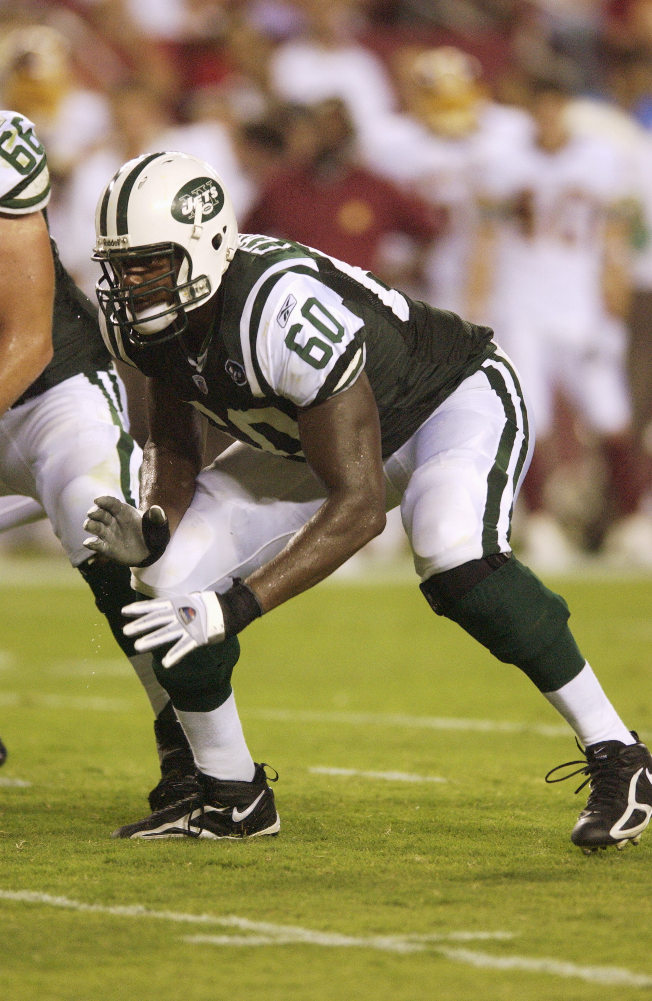 LANDOVER, MD - AUGUST 19: Tackle D'Brickshaw Ferguson #60 of the New York Jets gets set for play during the NFL preseason game against the Washington Redskins August 19, 2006 at FedEx Field in Landover, Maryland. (Photo by Greg Fiume/Getty Images) LANDOVER, MD - AUGUST 19: Tackle D'Brickshaw Ferguson #60 of the New York Jets gets set for play during the NFL preseason game against the Washington Redskins August 19, 2006 at FedEx Field in Landover, Maryland. (Photo by Greg Fiume/Getty Images)