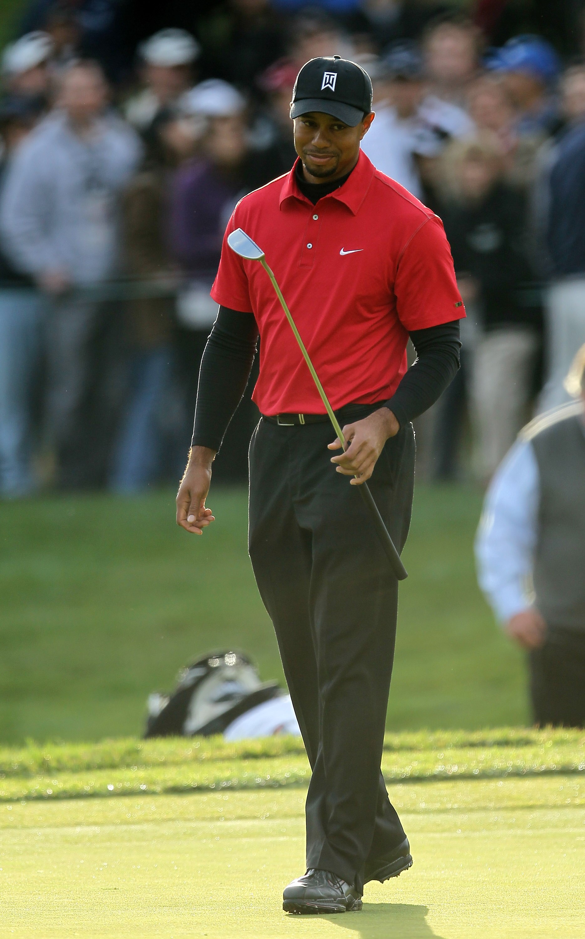 THOUSAND OAKS, CA - DECEMBER 5:  Tiger Woods reacts as his birdie putt attempt misses on the first playoff hole during the final round of the Chevron World Challenge at Sherwood Country Club on December 5, 2010 in Thousand Oaks, California. Graeme McDowel