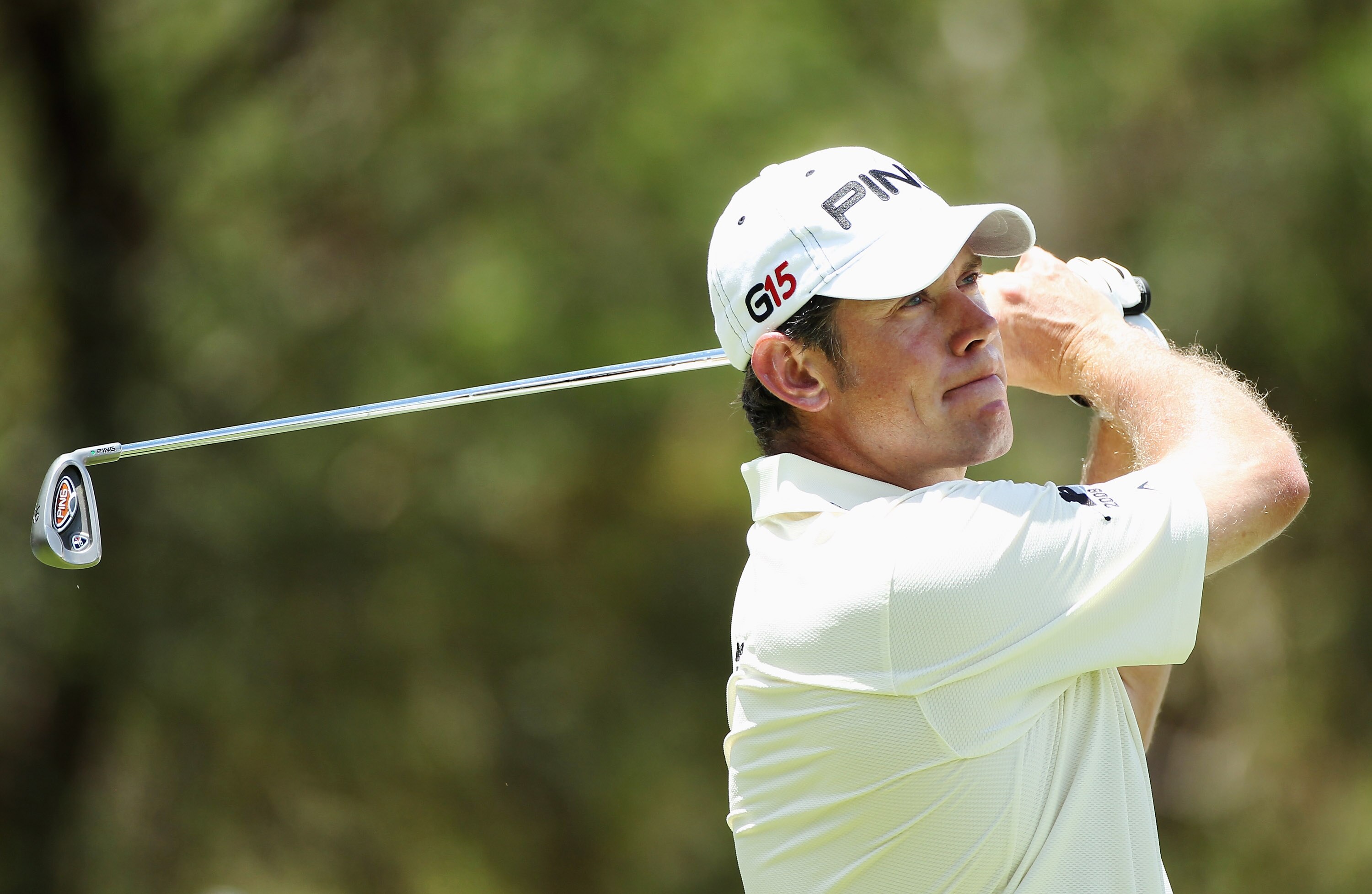 SUN CITY, SOUTH AFRICA - DECEMBER 05:  Lee Westwood of England tees off on the fourth hole during the final round of the 2010 Nedbank Golf Challenge at the Gary Player Country Club Course  on December 5, 2010 in Sun City, South Africa.  (Photo by Warren L