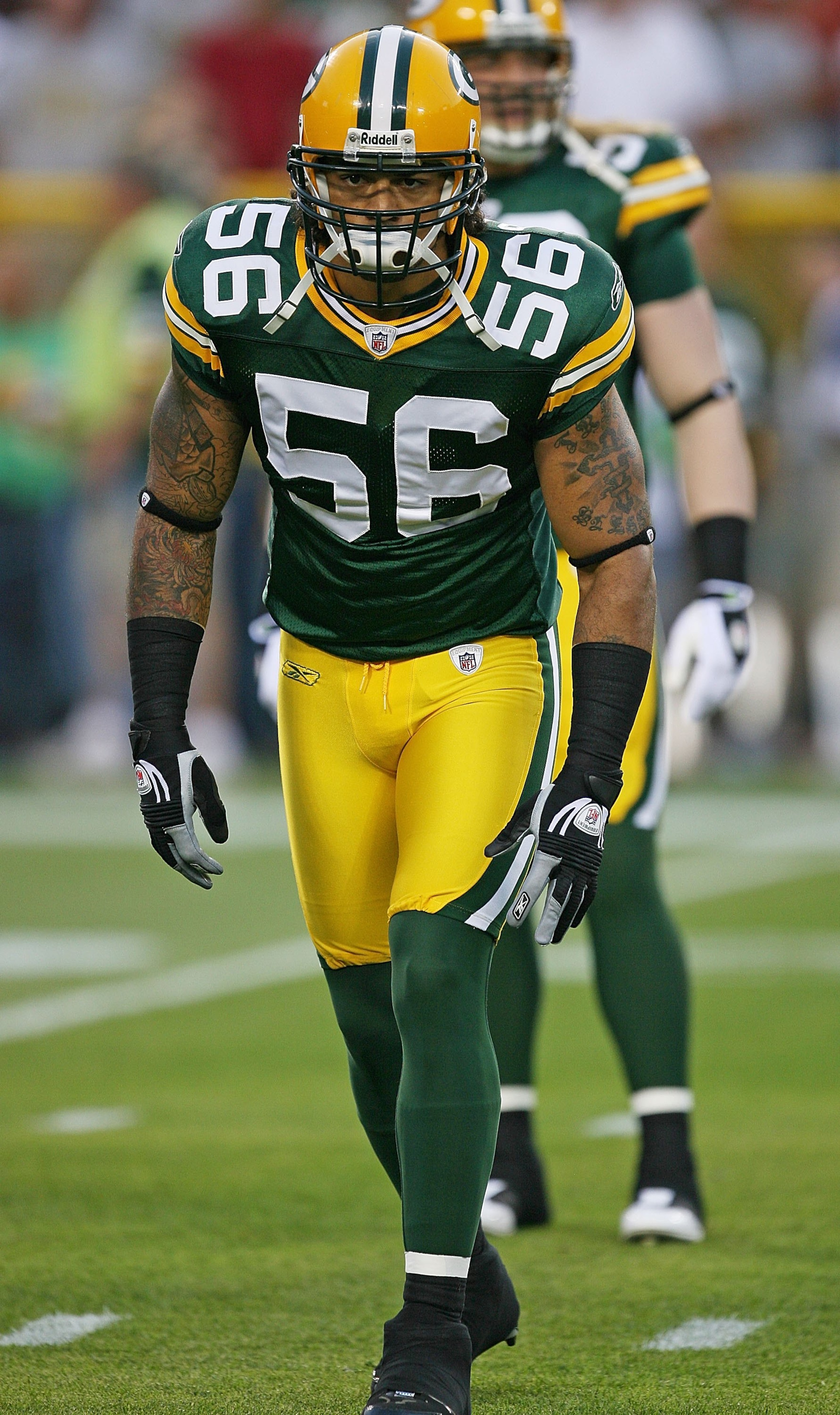 GREEN BAY, WI - SEPTEMBER 13: Nick Barnett #56 of the Green Bay Packers participates in warm-ups before a game against the Chicago Bears on September 13, 2009 at Lambeau Field in Green Bay, Wisconsin. The Packers defeated the Bears 21-15. (Photo by Jonath