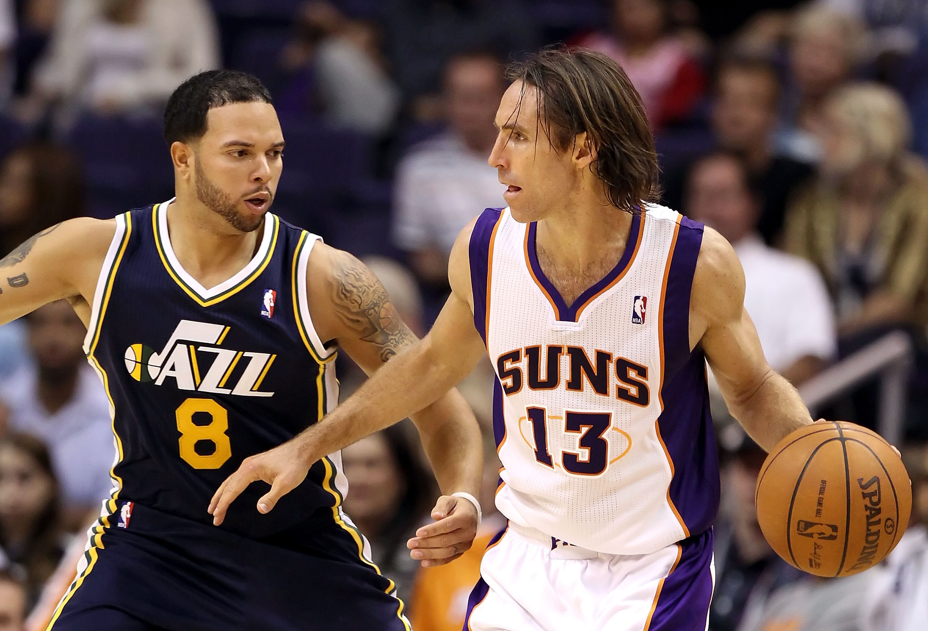 PHOENIX - OCTOBER 12:  Steve Nash #13 of the Phoenix Suns looks to pass the ball during the preseason NBA game against the Utah Jazz at US Airways Center on October 12, 2010 in Phoenix, Arizona. NOTE TO USER: User expressly acknowledges and agrees that, b