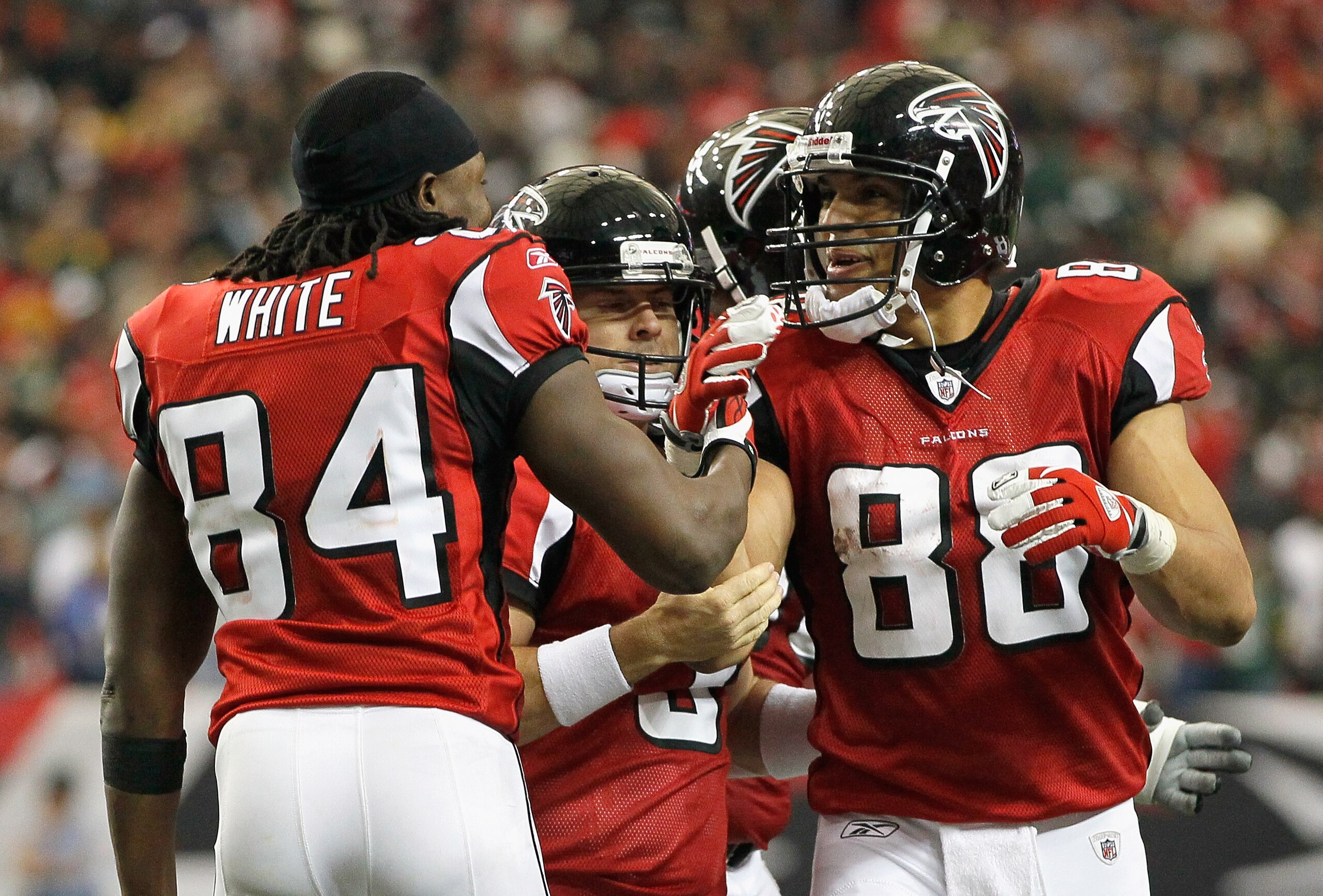 ATLANTA - NOVEMBER 28:  Matt Bryant #3, Roddy White #84 and Tony Gonzalez #88 of the Atlanta Falcons react after Bryant's go-ahead field goal in the final seconds against the Green Bay Packers at Georgia Dome on November 28, 2010 in Atlanta, Georgia.  (Ph
