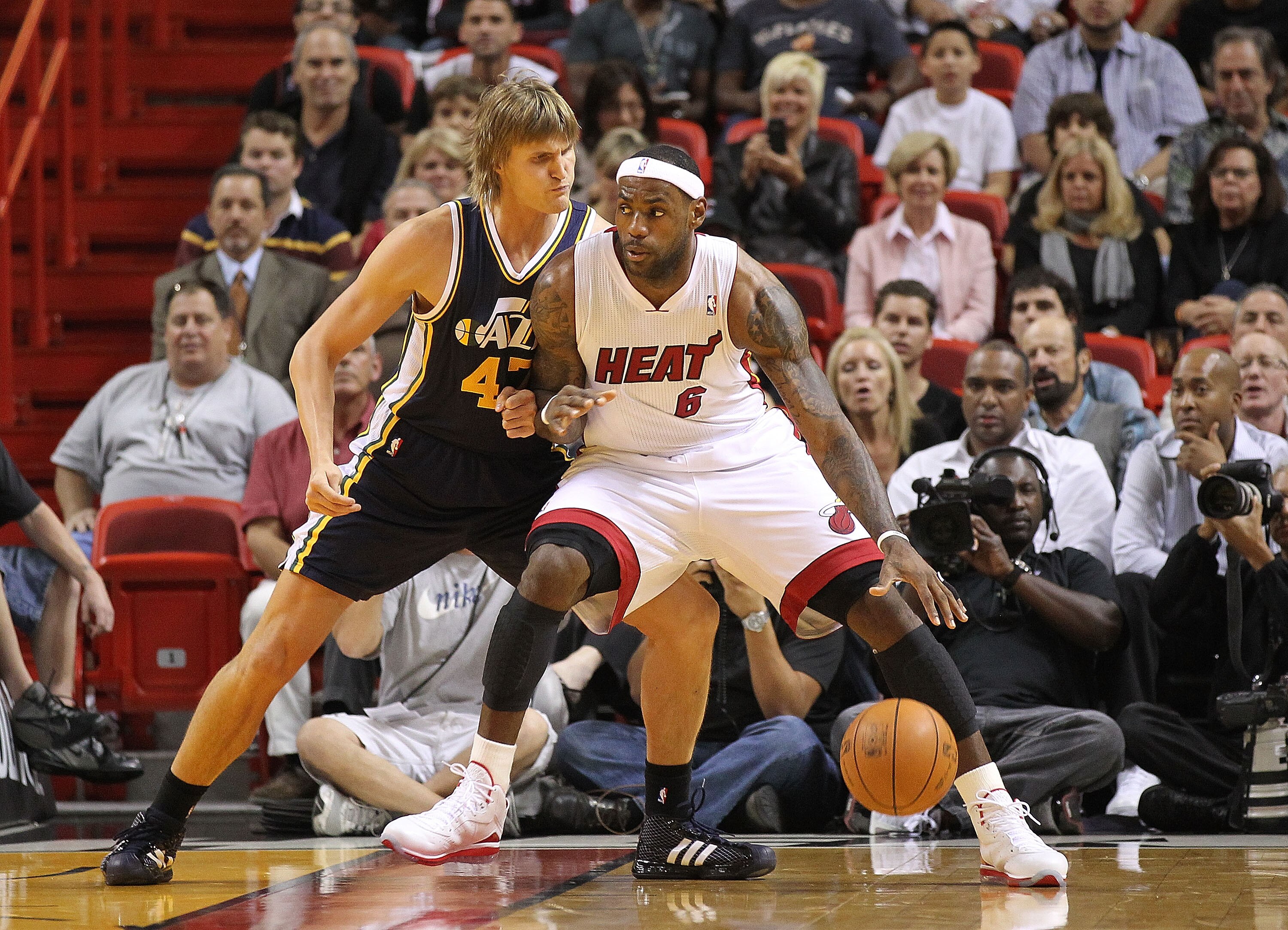 MIAMI - NOVEMBER 09:  Lebron James #6 of the Miami Heat fights for position with Andrei Kirilenko #47 during a game against the Utah Jazz at American Airlines Arena on November 9, 2010 in Miami, Florida. NOTE TO USER: User expressly acknowledges and agree