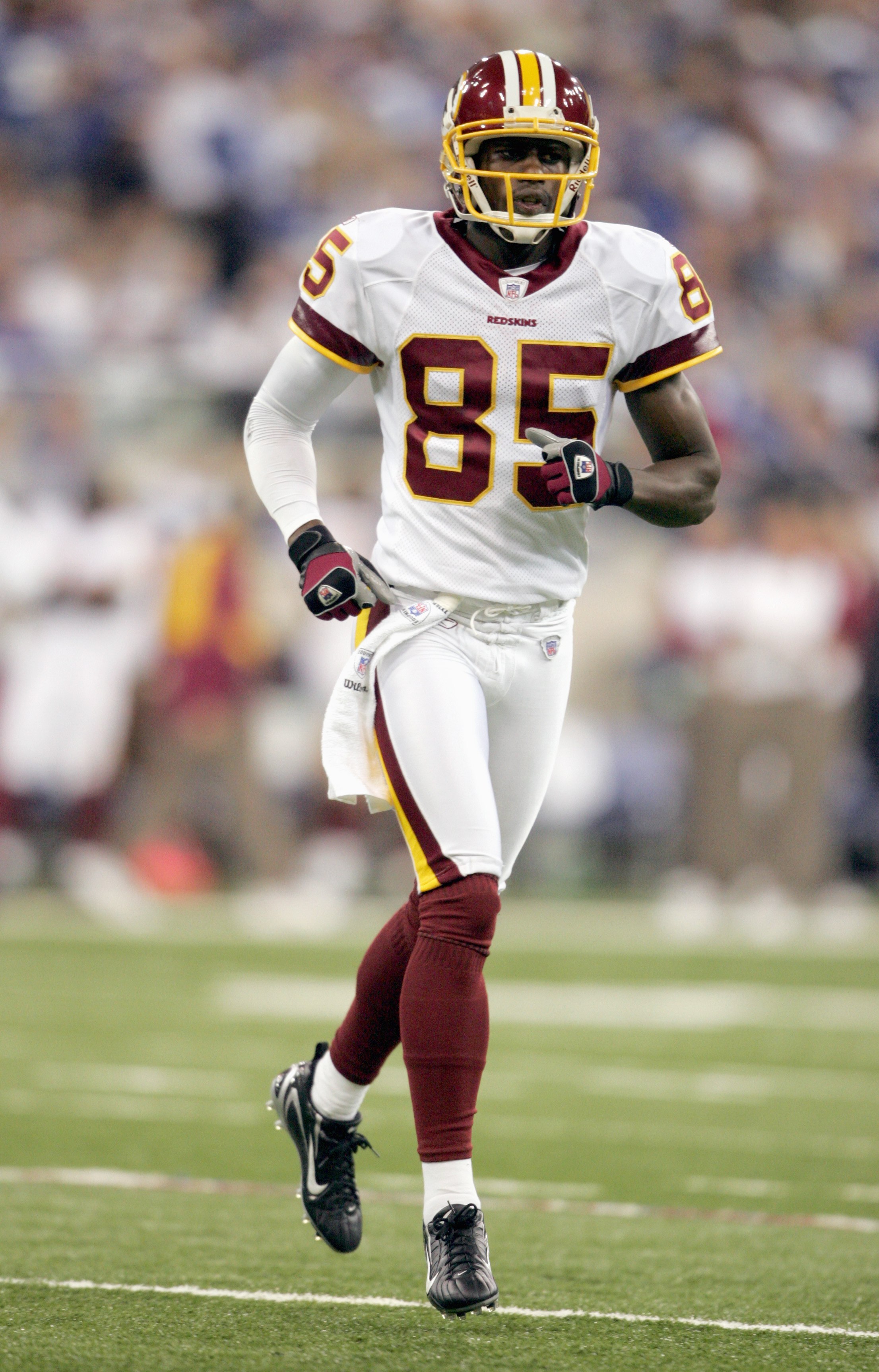 INDIANAPOLIS - OCTOBER 22:  Brandon Lloyd #85 of the Washington Redskins jogs on the field during the NFL game against the Indianapolis Colts on October 22, 2006 at the RCA Dome in Indianapolis, Indiana. The Colts won 36-22. (Photo by Andy Lyons/Getty Ima