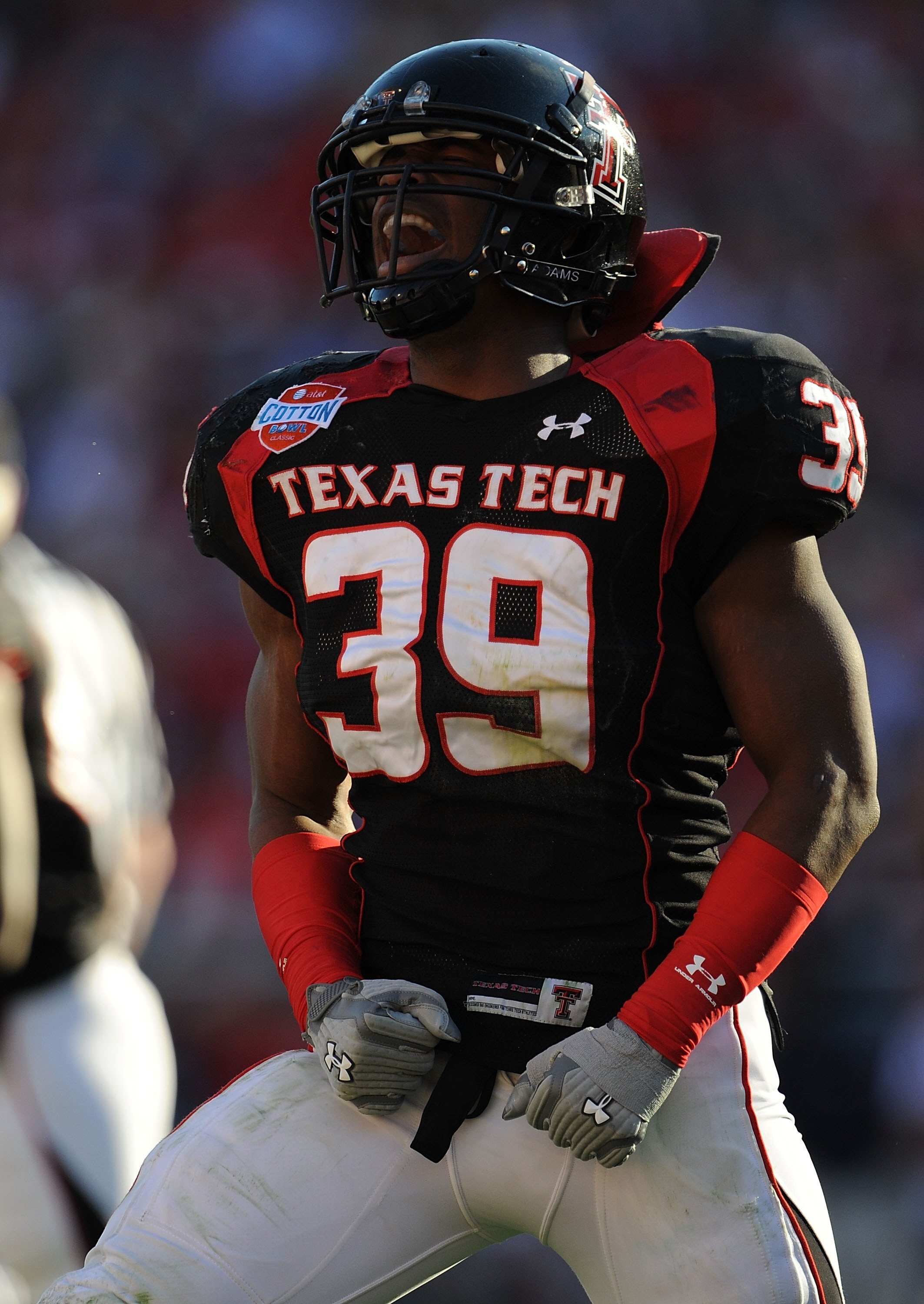 DALLAS - JANUARY 02:  Marlon Williams #39 of the Texas Tech Red Raiders during play against the Mississippi Rebels during the AT&T Cotton Bowl on January 2, 2009 at the Cotton Bowl in Dallas, Texas.  (Photo by Ronald Martinez/Getty Images)