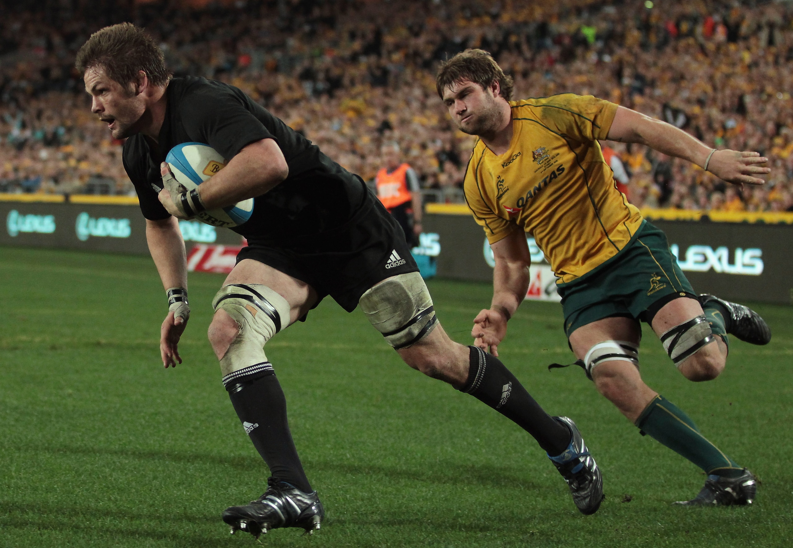 SYDNEY, AUSTRALIA - SEPTEMBER 11:  Richie McCaw of the All Blacks dives over to score during the 2010 Tri-Nations Bledisloe Cup match between the Australian Wallabies and the New Zealand All Blacks at ANZ Stadium on September 11, 2010 in Sydney, Australia