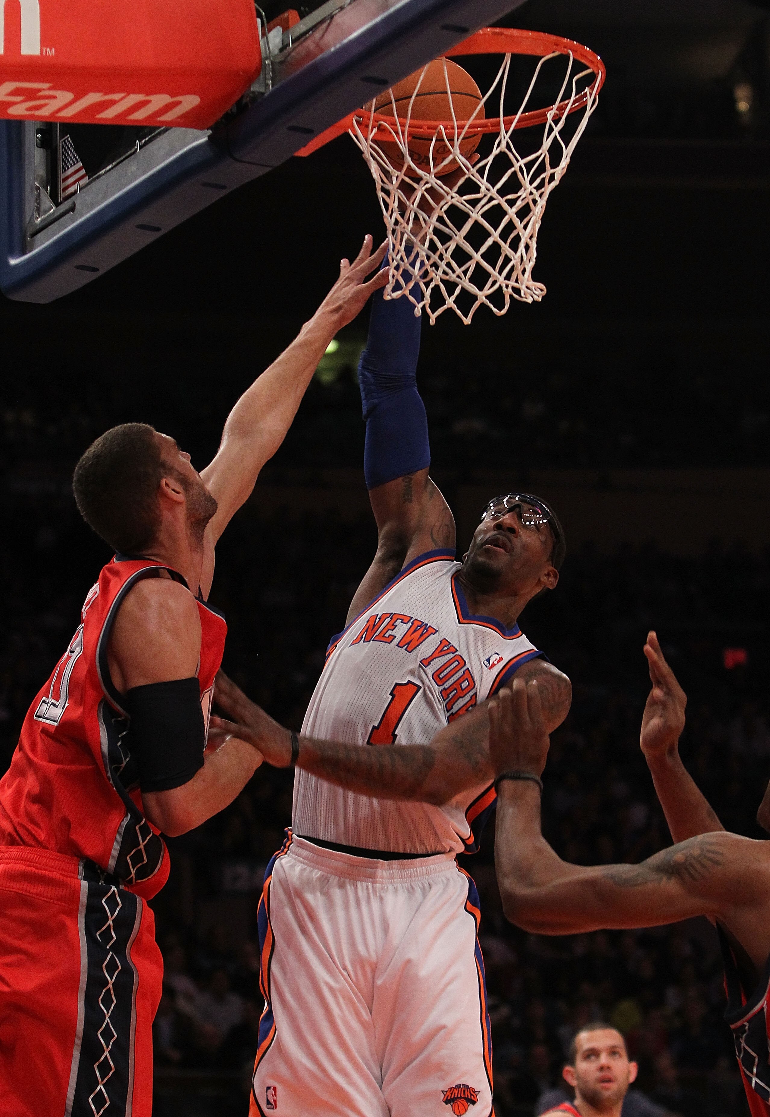 NEW YORK, NY - NOVEMBER 30:  Amar'e Stoudemire #1 of the New York Knicks shoots the ball over Brook Lopez #11 of the New Jersey Nets on November 30, 2010 at Madison Square Garden in New York City. NOTE TO USER: User expressly acknowledges and agrees that,