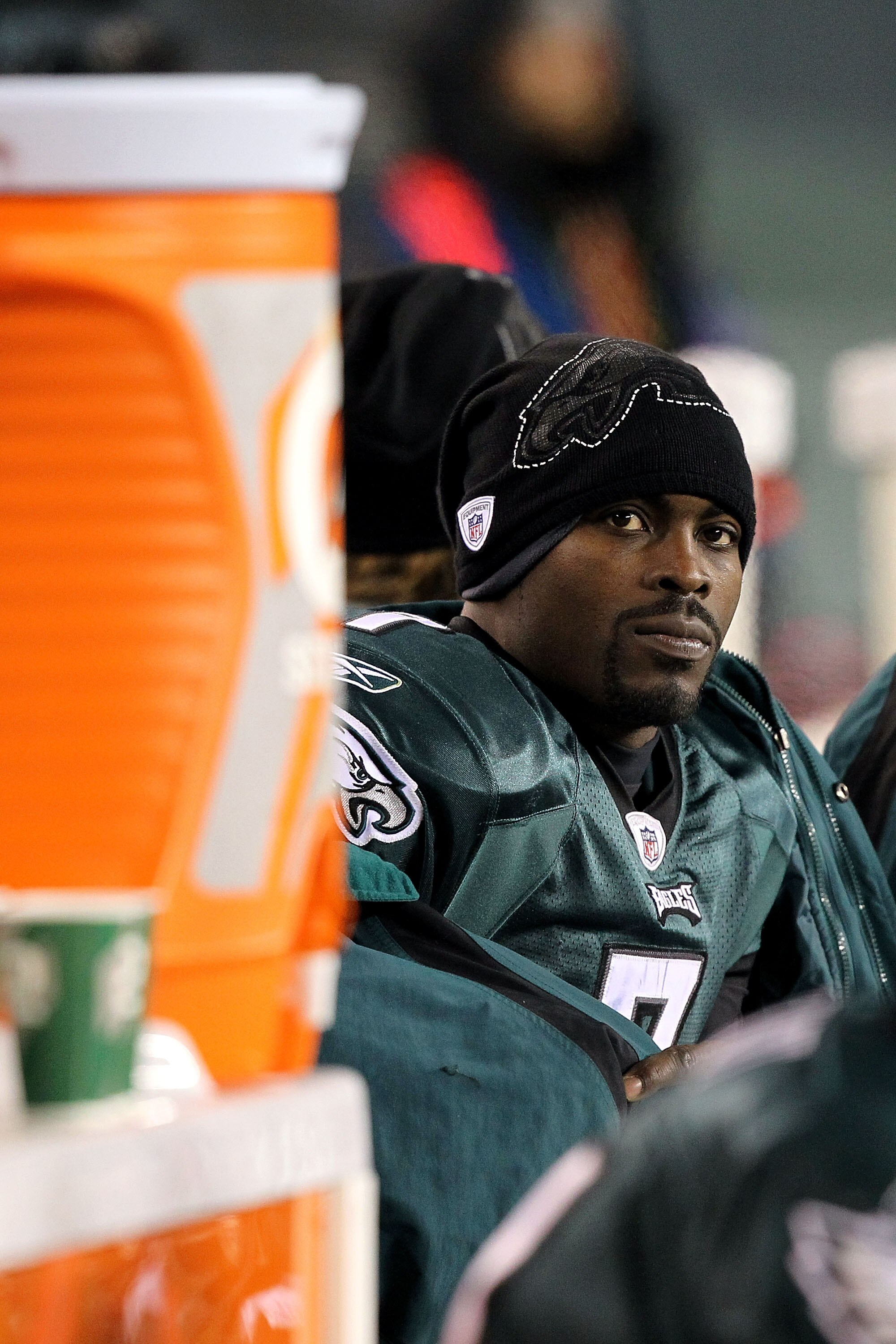 PHILADELPHIA, PA - DECEMBER 02:  Michael Vick #7 of the Philadelphia Eagles looks on from the bench late in the fourth quarter against the Houston Texans at Lincoln Financial Field on December 2, 2010 in Philadelphia, Pennsylvania. The Eagles won 34-24.