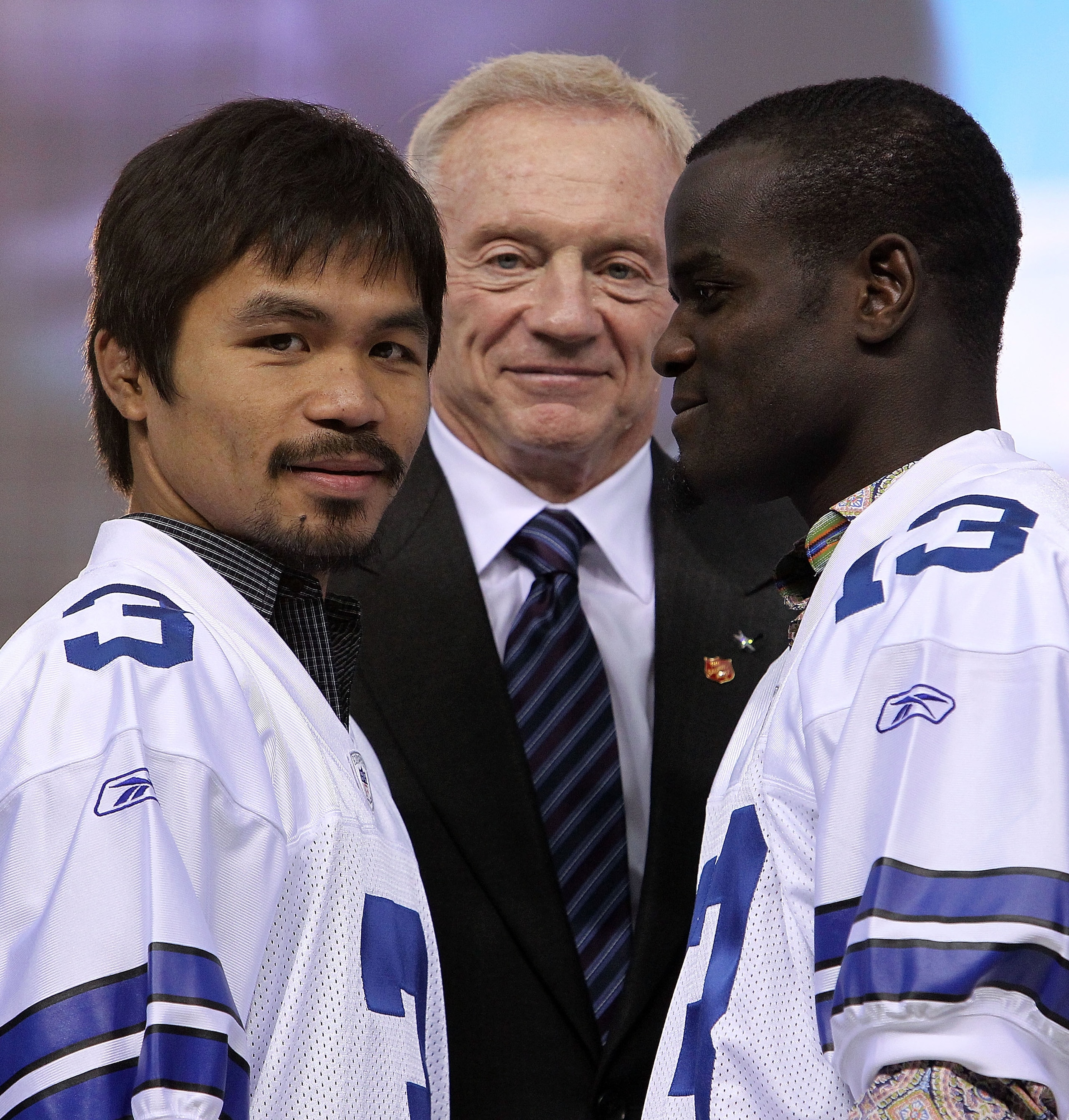 ARLINGTON, TX - JANUARY 19:  Boxers Manny Pacquiao (L) and Joshua Clottey (R) pose for photos with Jerry Jones, owner of the Dallas Cowboys, at Cowboys Stadium on January 19, 2010 in Arlington, Texas.  (Photo by Ronald Martinez/Getty Images)